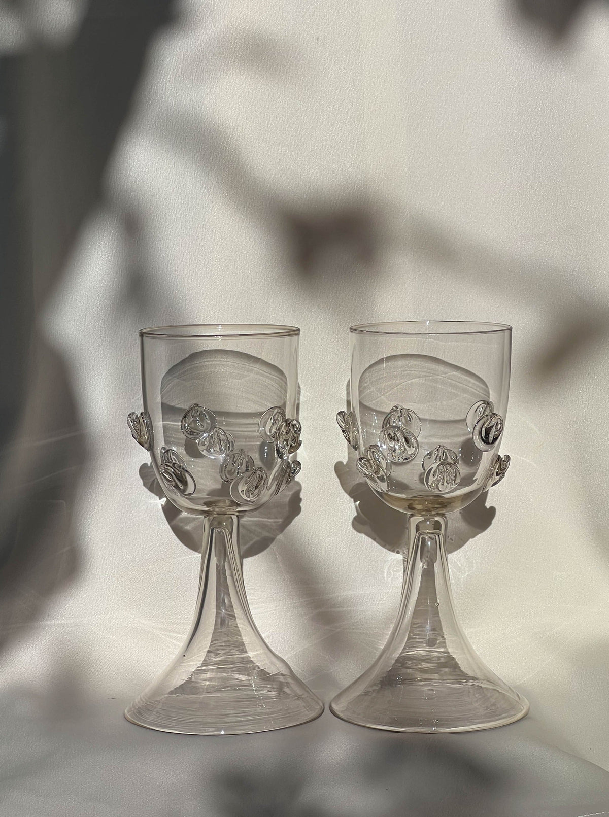 Pair of Mouthblown Wine Goblets - Dots — side angle showing clear glass and decorative dots