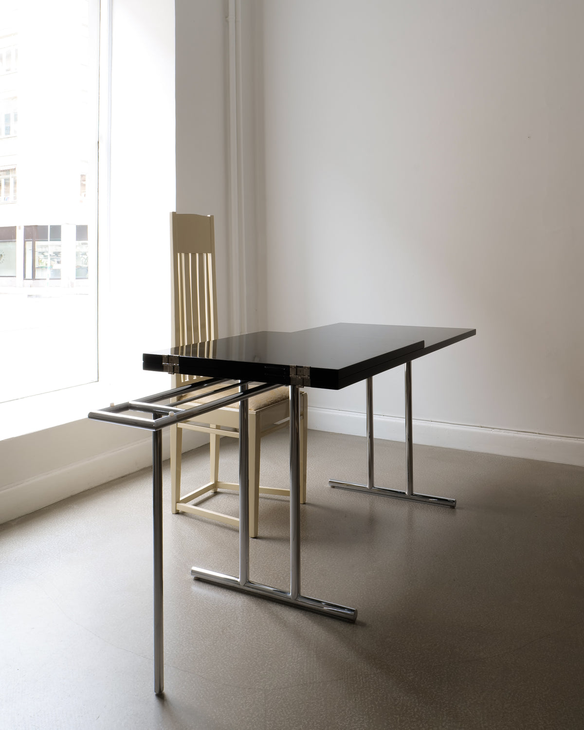 Lou Perou extendable table black top chrome legs Eileen Grey