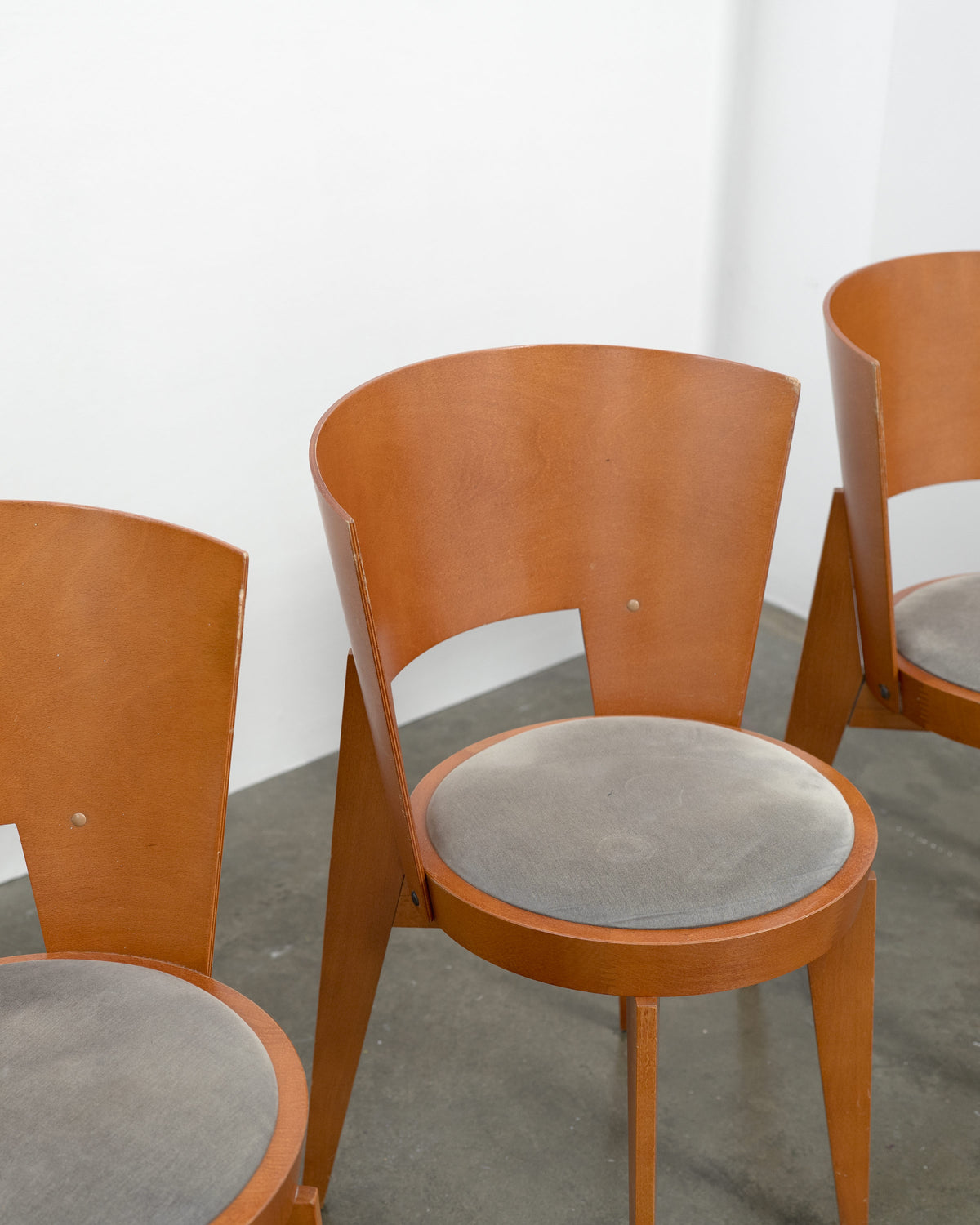 4 "Ola" Dining Chairs designed by Pascal Mourgue — back view highlighting wooden structure