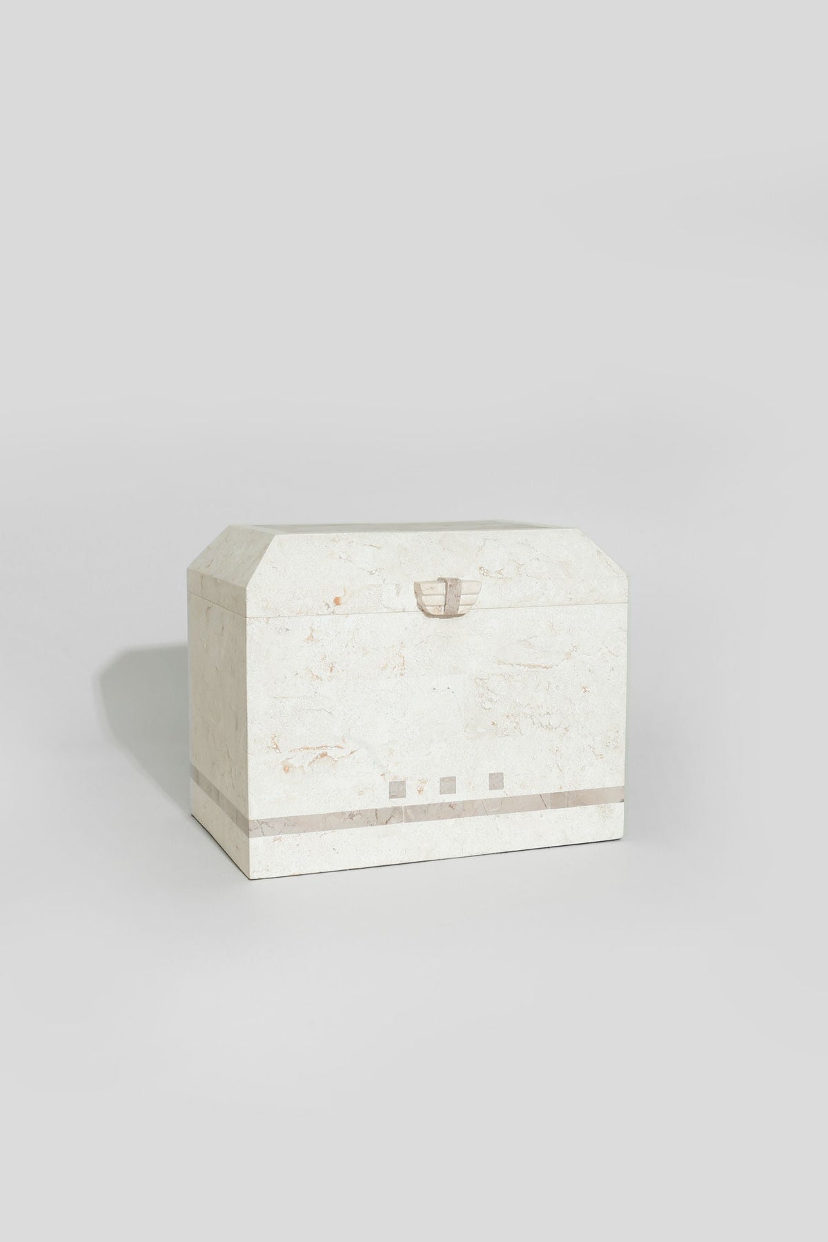 Tessellated stone jewelry box front view with brass clasp