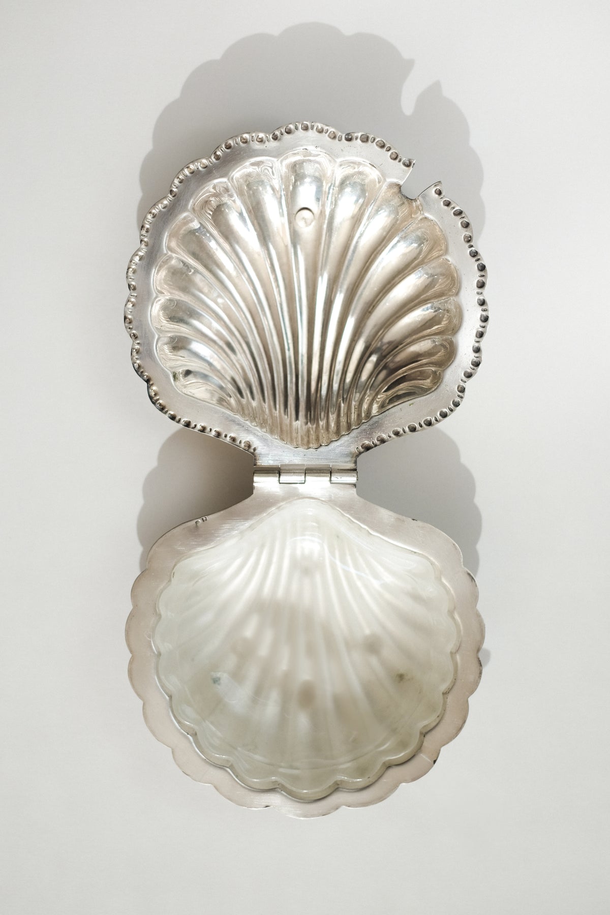 Shell Shaped Butter Dish — top view of polished silver surface