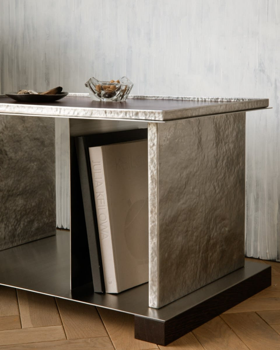 YUMA marble side table with open storage compartment and books