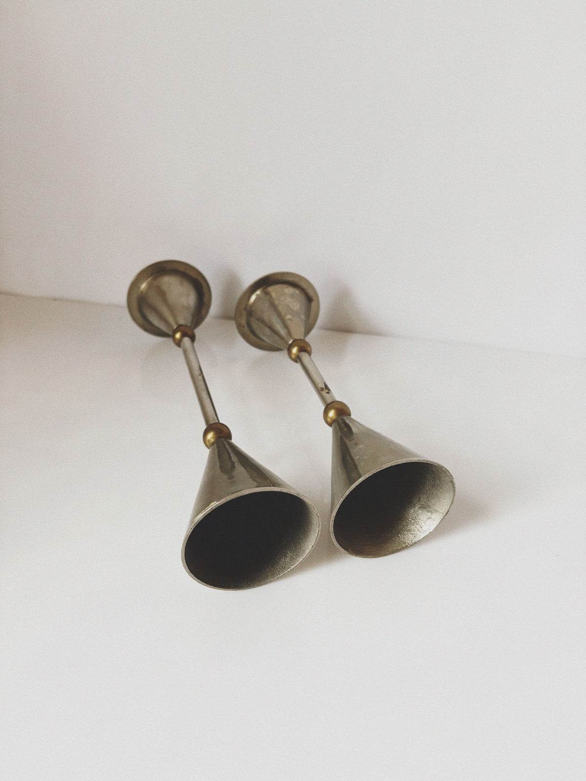 Postmodern Metal and Brass Candleholders — top view of tapered brass design