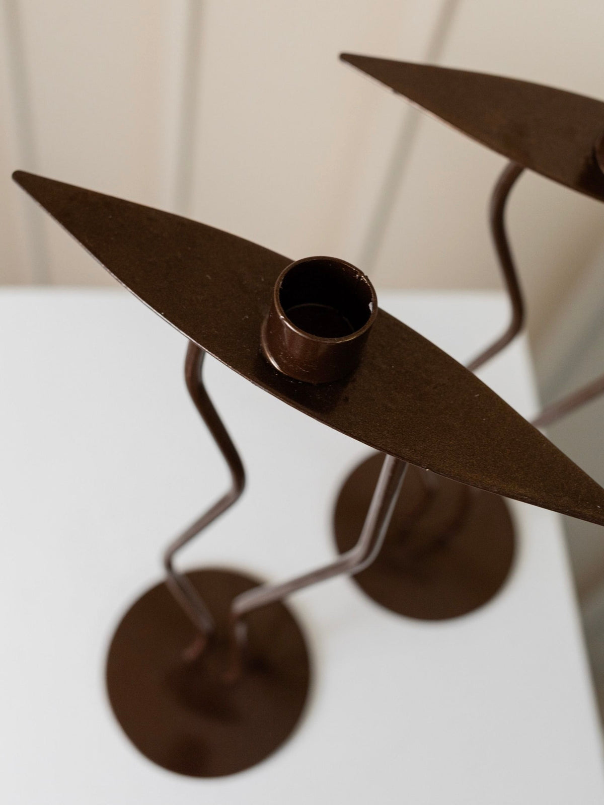 Two Metal Candlesticks Memphis Style — top view of brown metal design
