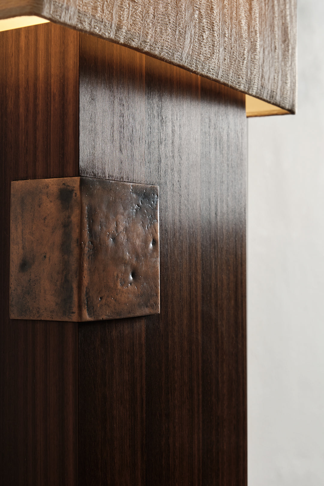 Esperia table lamp wood grain detail with weathered metal accent