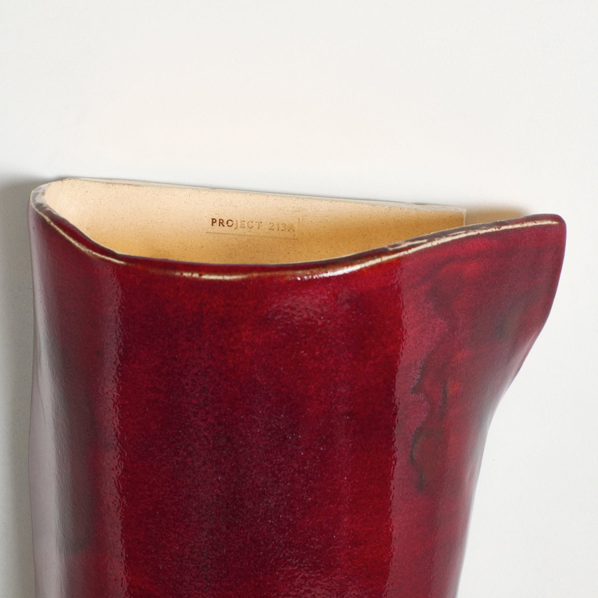 Papel Wall Light (X large) — back view showing red ceramic finish