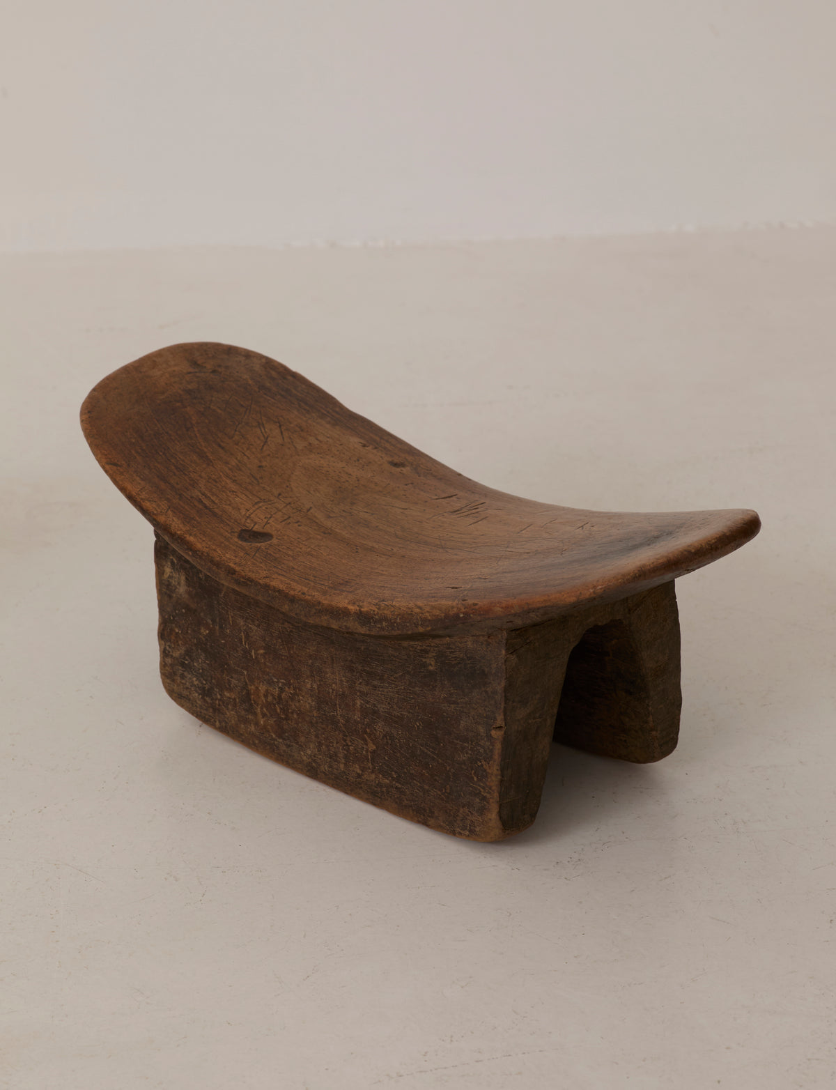 Mid-Century African Senufo Stool in Solid Wood — close-up of textured wooden surface