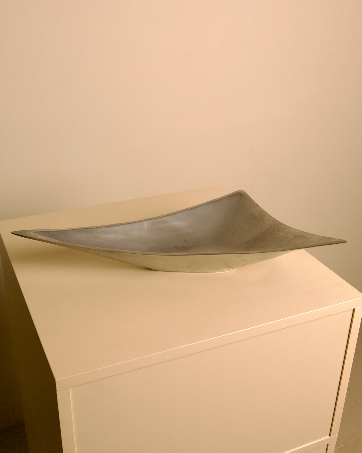 Pair of Italian "Triangle" aluminium catch-alls, 1980s — lifestyle setting