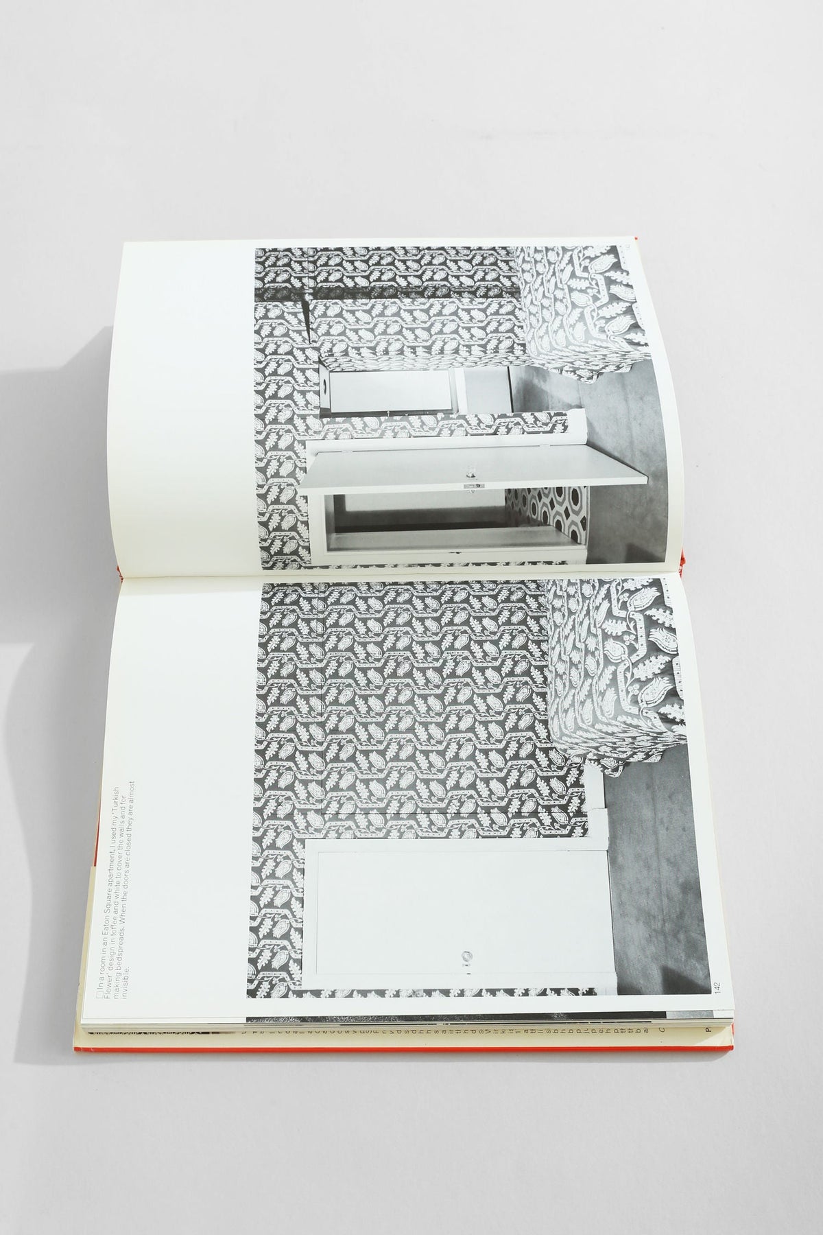 David Hicks on Home Decoration' Book — open on patterned page in modern setting