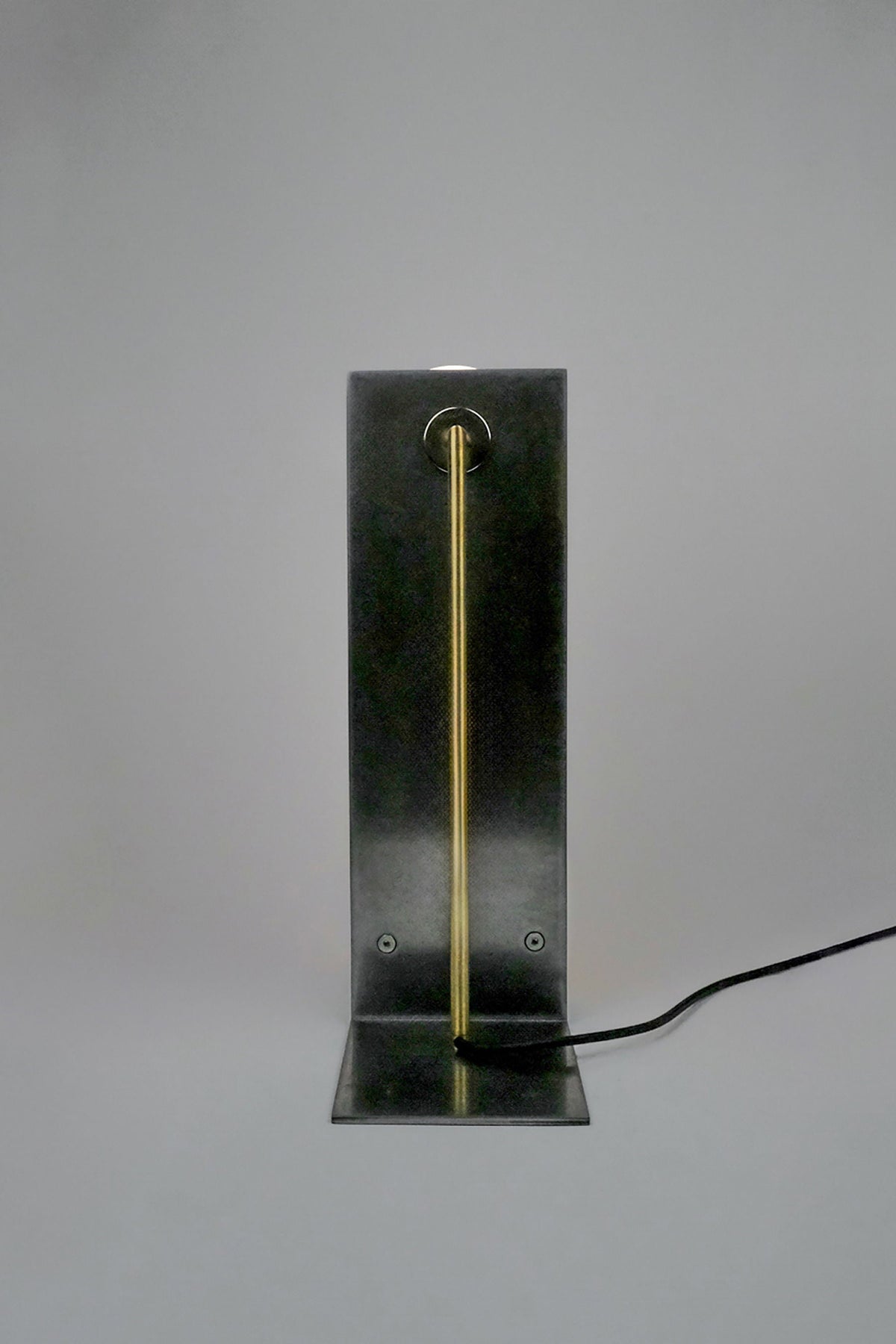 Himalaya Lunar vertical table lamp with brass rod on dark base