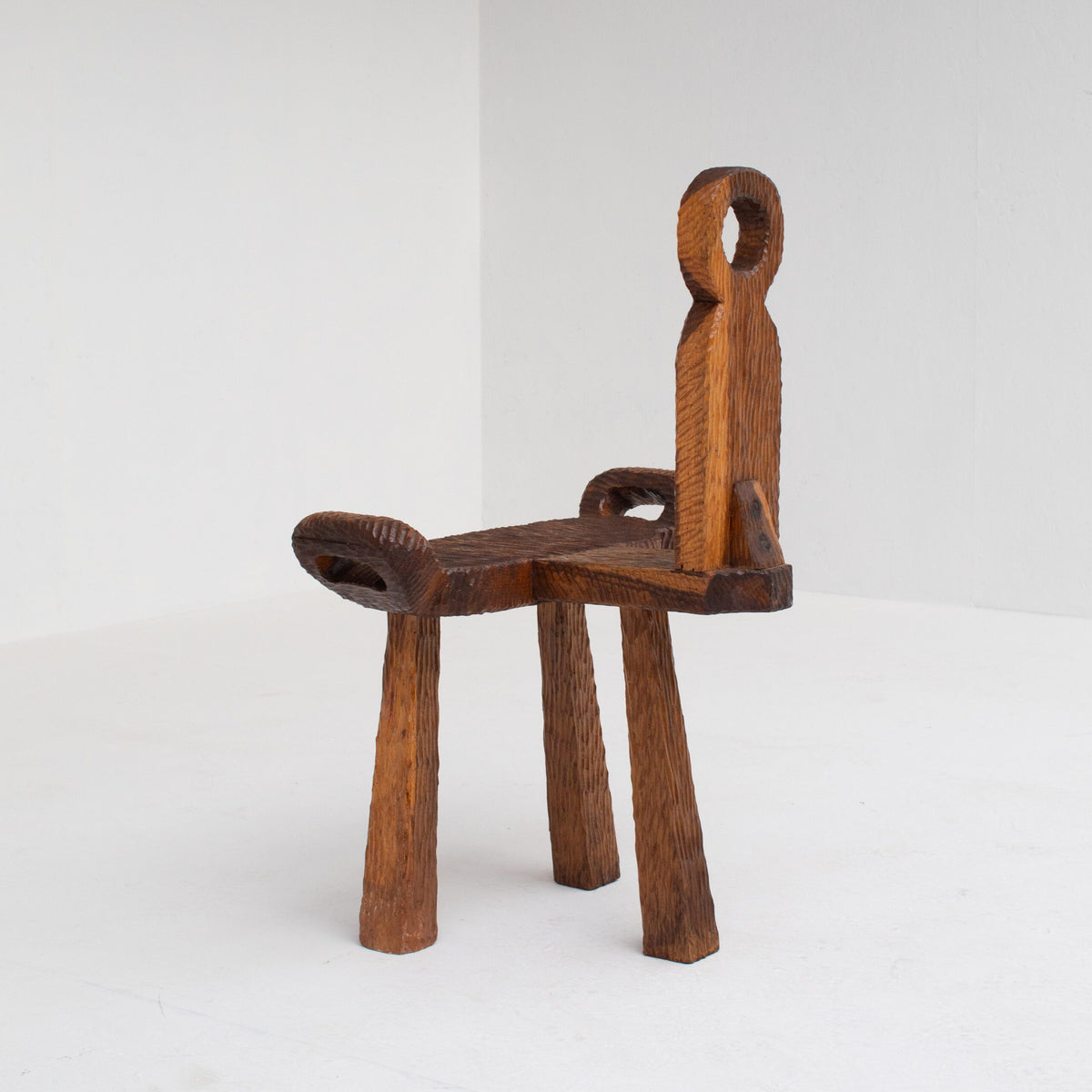 Brutalist Wooden Chair — angled view highlighting textured wooden surface