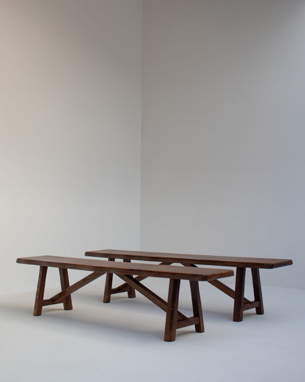 Rustique Bench in Wood — angled view in minimalist setting
