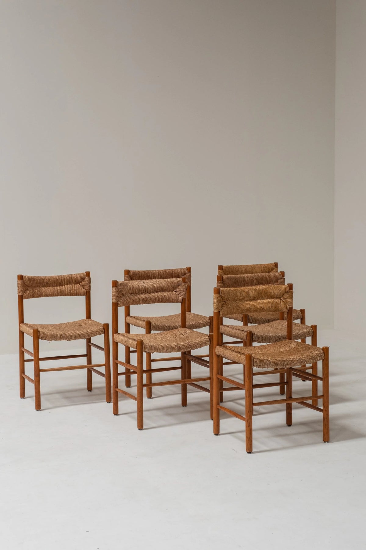 Set of 6 Charlotte Perriand Dordogne Chairs — side angle