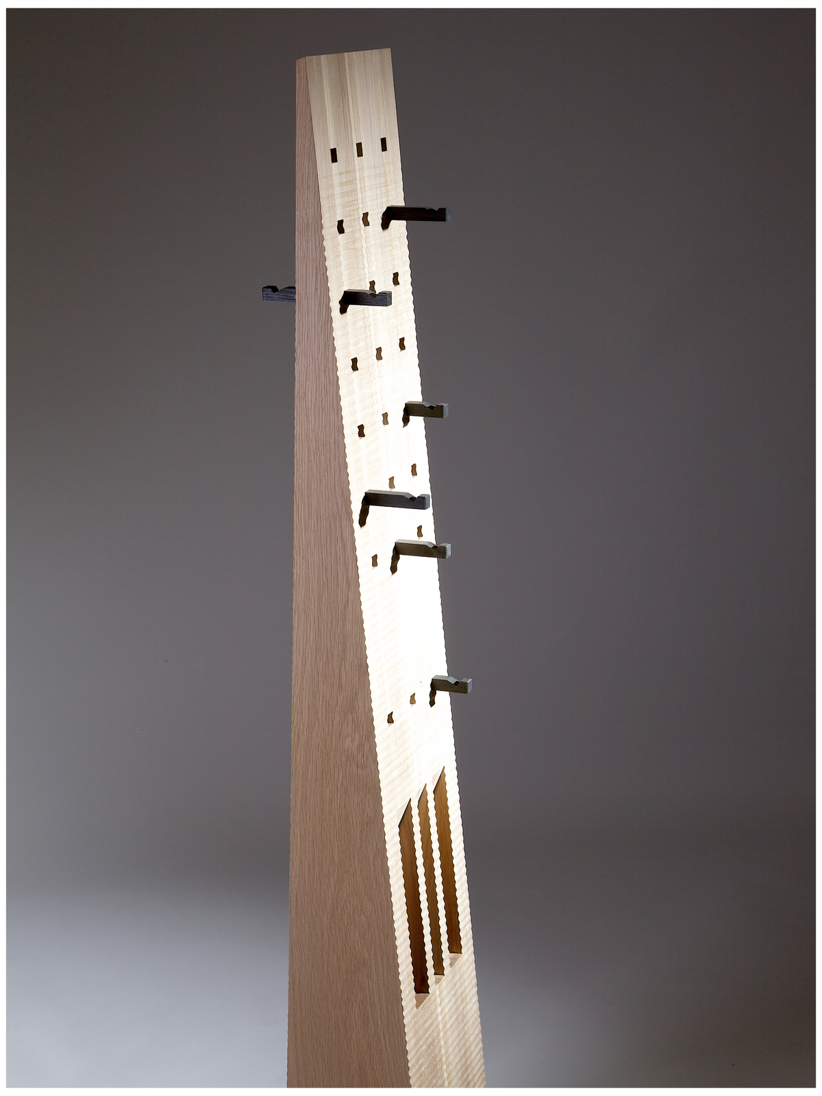 Totem Coat Stand - Oak and 5500 years old Bog Oak — side view showing wooden structure and hooks