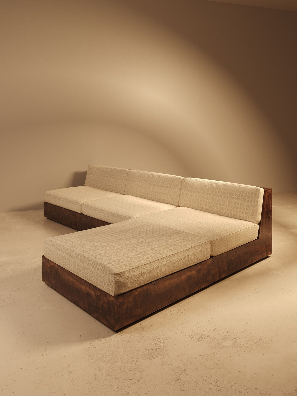 KAVA Collection I POUF – Walnut Burl Finish, Dedar Upholstery — side angle showing upholstered seat and wooden base
