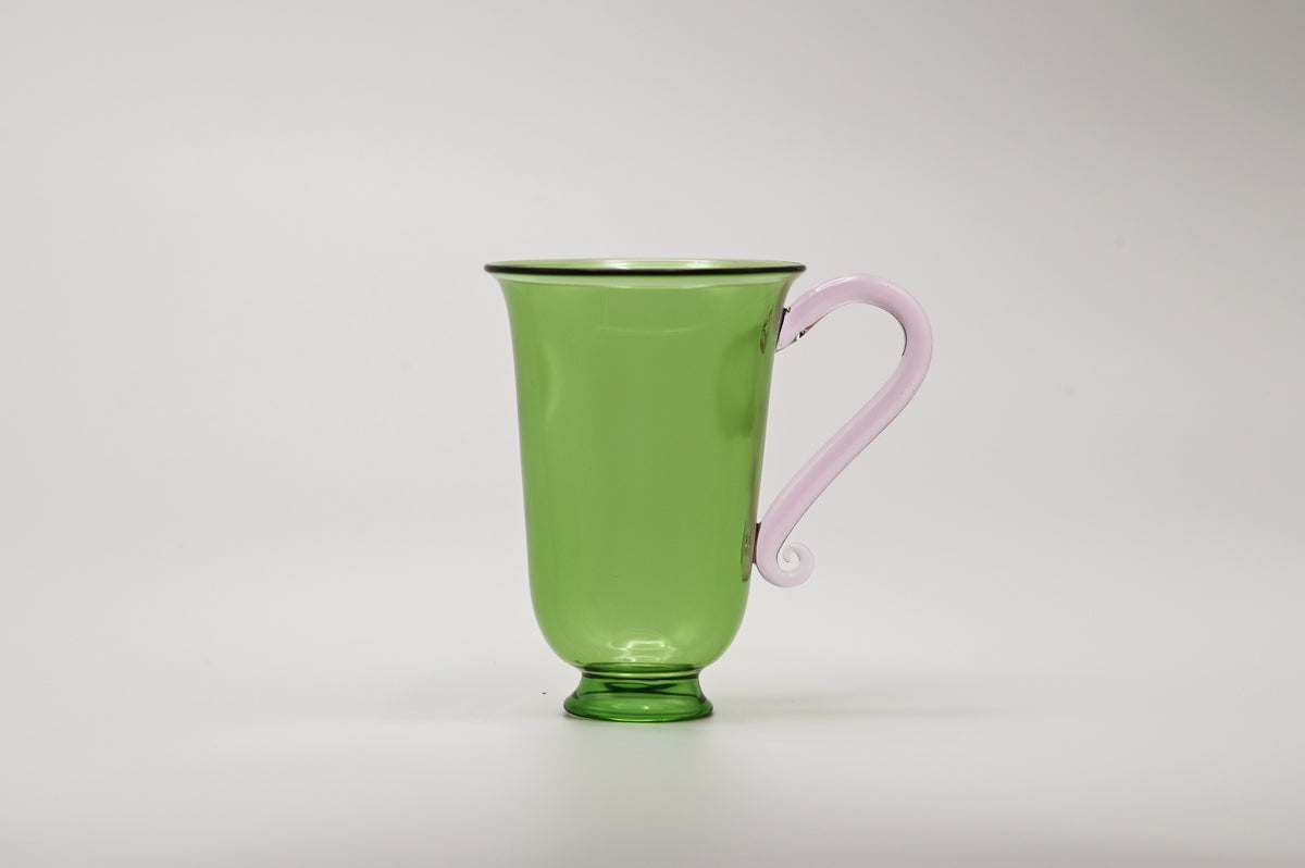 Grande Tasse Set — side view of green glass with pink handle