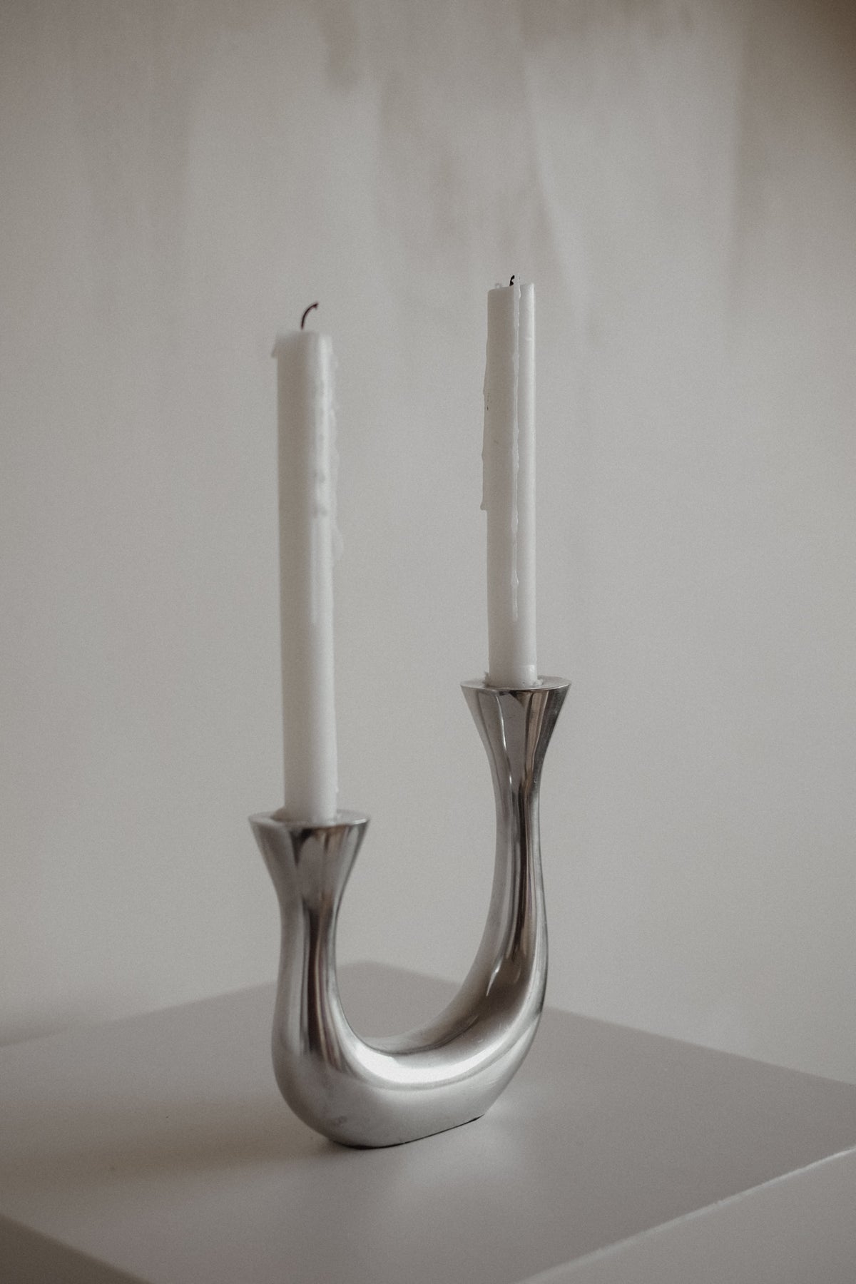 Sculptural Harmony Double Taper Candelabra — side angle