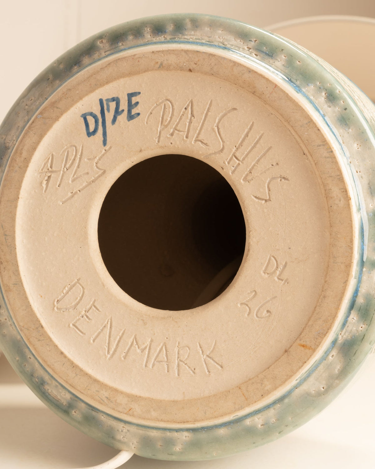 Bottom view showing Palshus Denmark ceramic lamp base signature