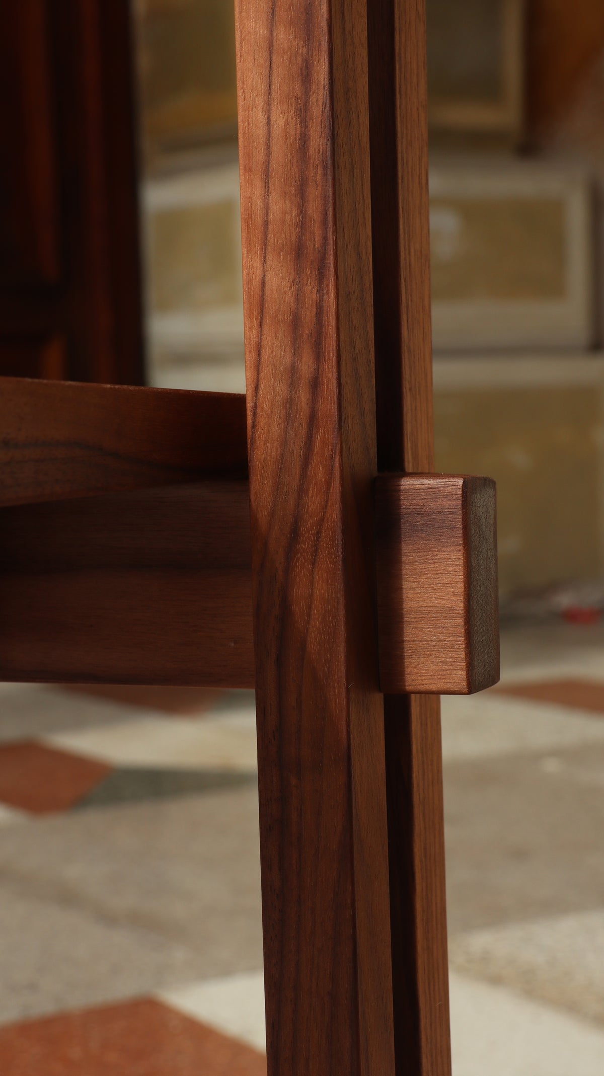 Wood joinery detail of handcrafted stack chair construction