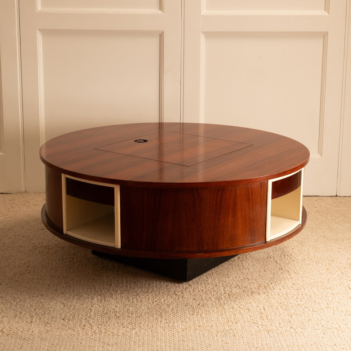 Swivel Coffee Table — back view highlighting rich wood finish and storage compartments