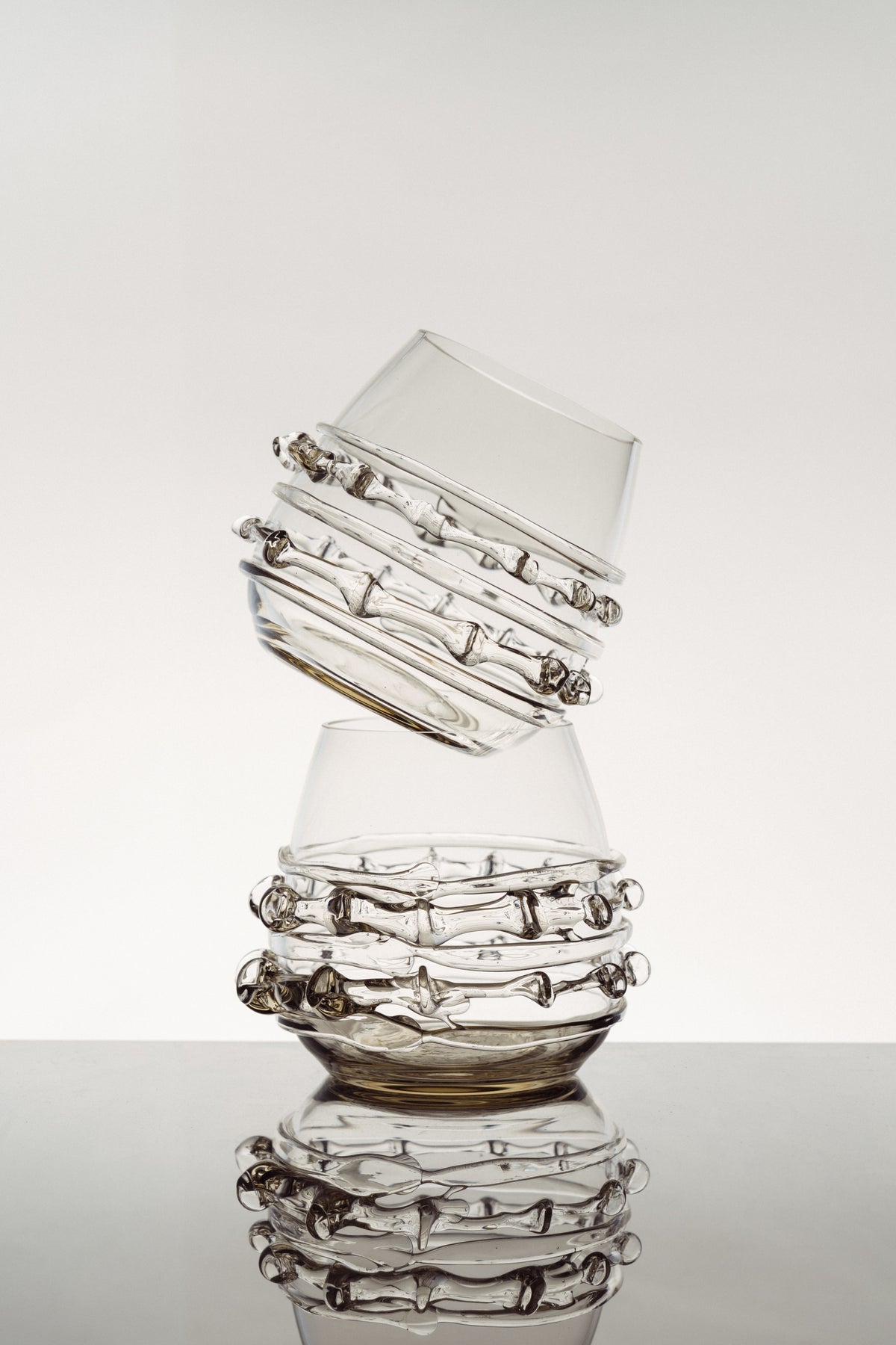 Contemporary Tumblr - Set of Two Handblown Glass Vessels — stacked view highlighting clear glass texture