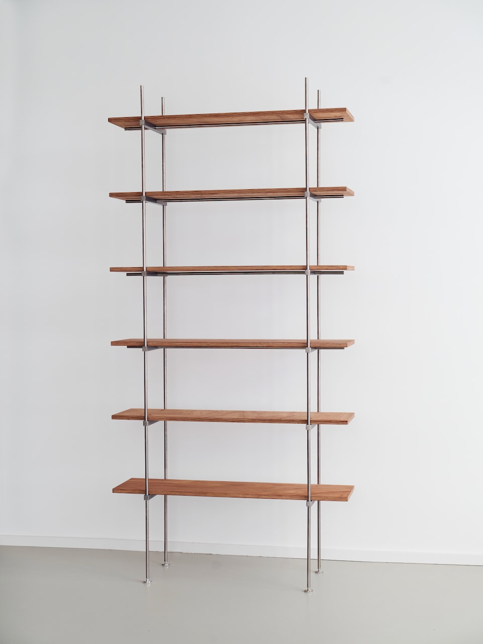 Spaghetti Shelf System — back view of wooden shelves with metal frame