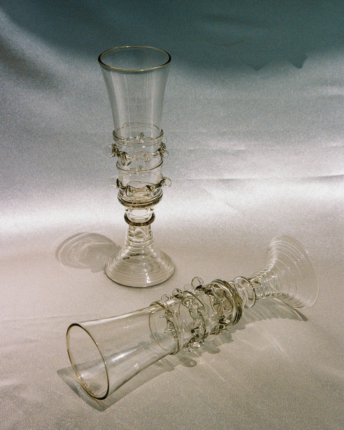 Mouthblown champagne flutes with seaweed-inspired twisted glass stems