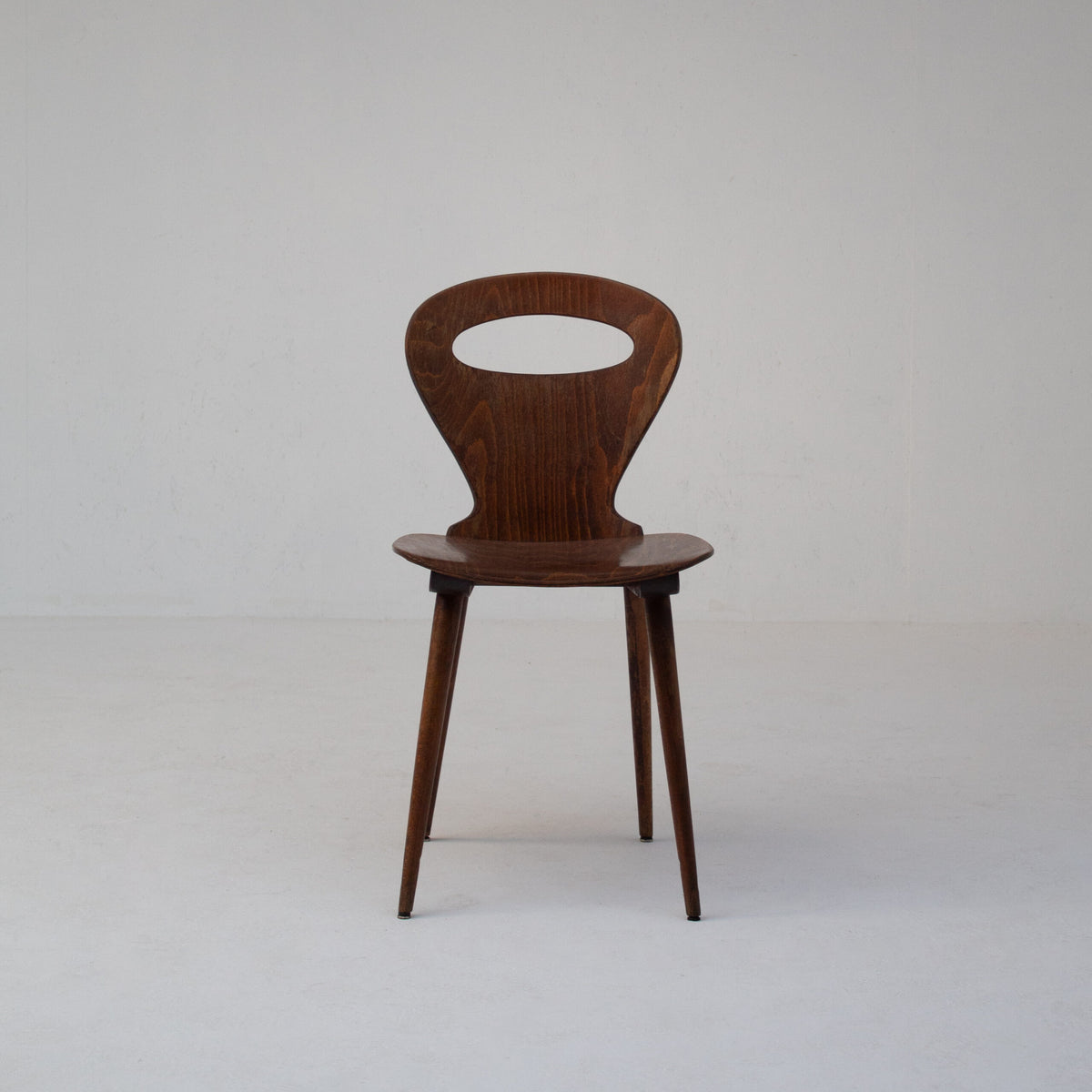 Set of Six Sculptural Wooden Dining Chairs — close-up