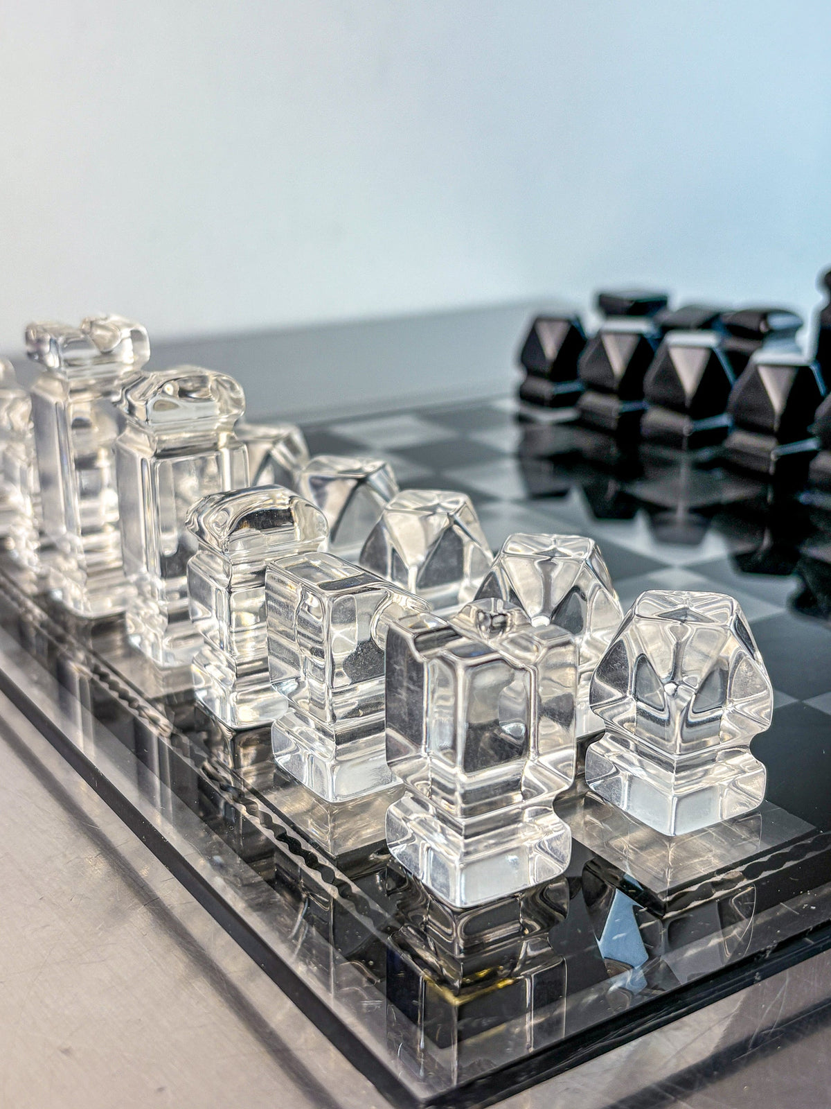 Felice Antonio Botta Acrylic Chessboard, Italy, 70s — top view of clear acrylic pieces on board