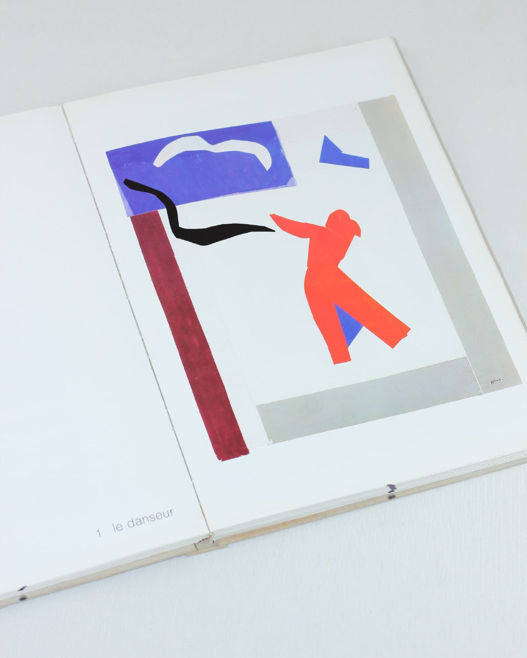 MATISSE PAPER CUTOUTS — open book view with colorful paper cutouts