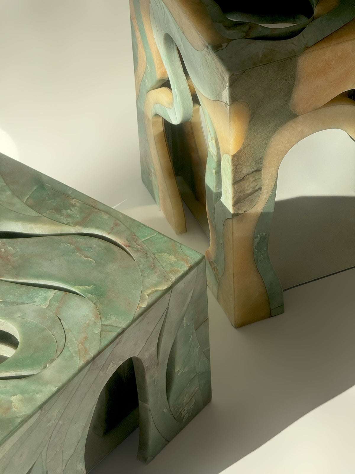 Orbis' Marble Side Table — angled view highlighting green marble texture