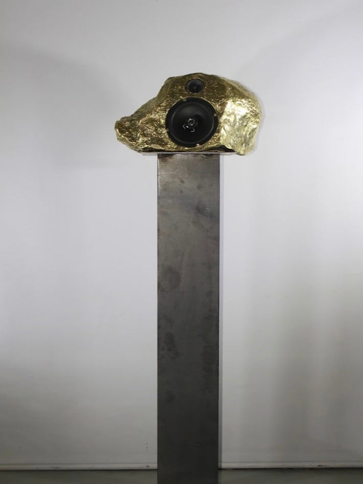 Bronze Singing-Stone MDL. C. Speaker — angled view on metal pedestal