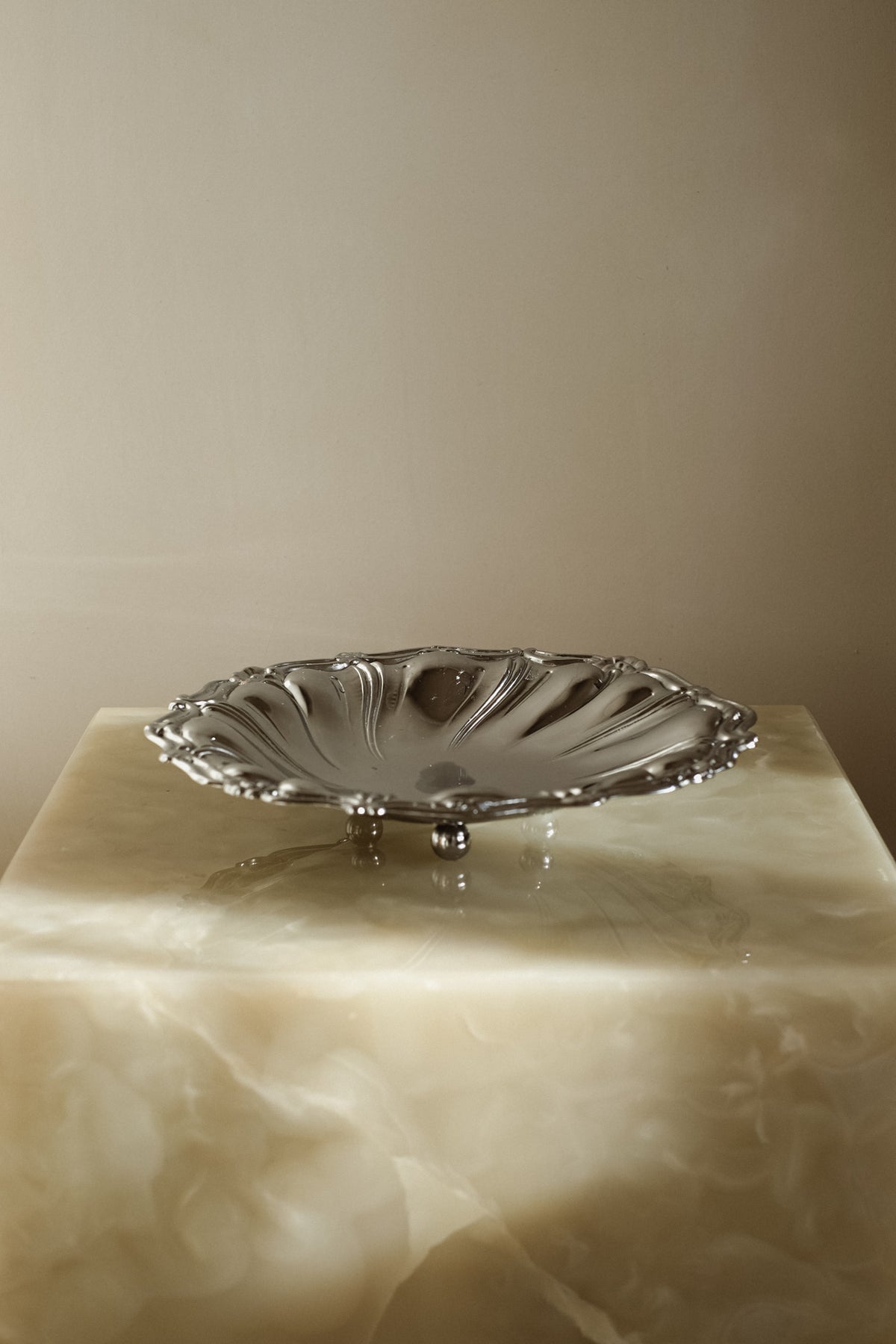 Italian Decorative Bowl — side angle on marble pedestal