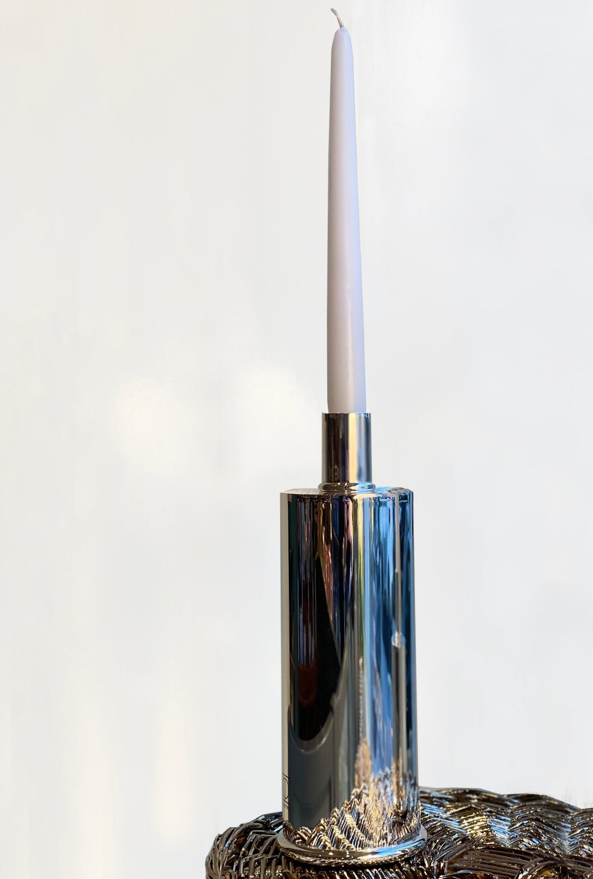 Elegant Candle Holders Silver Plated — close-up of polished silver surface with white candle