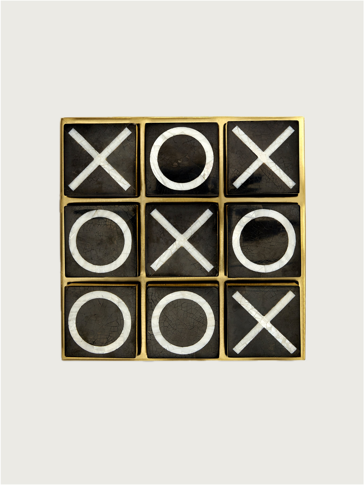 Deco Tic Tac Toe — top view of brass and black game board