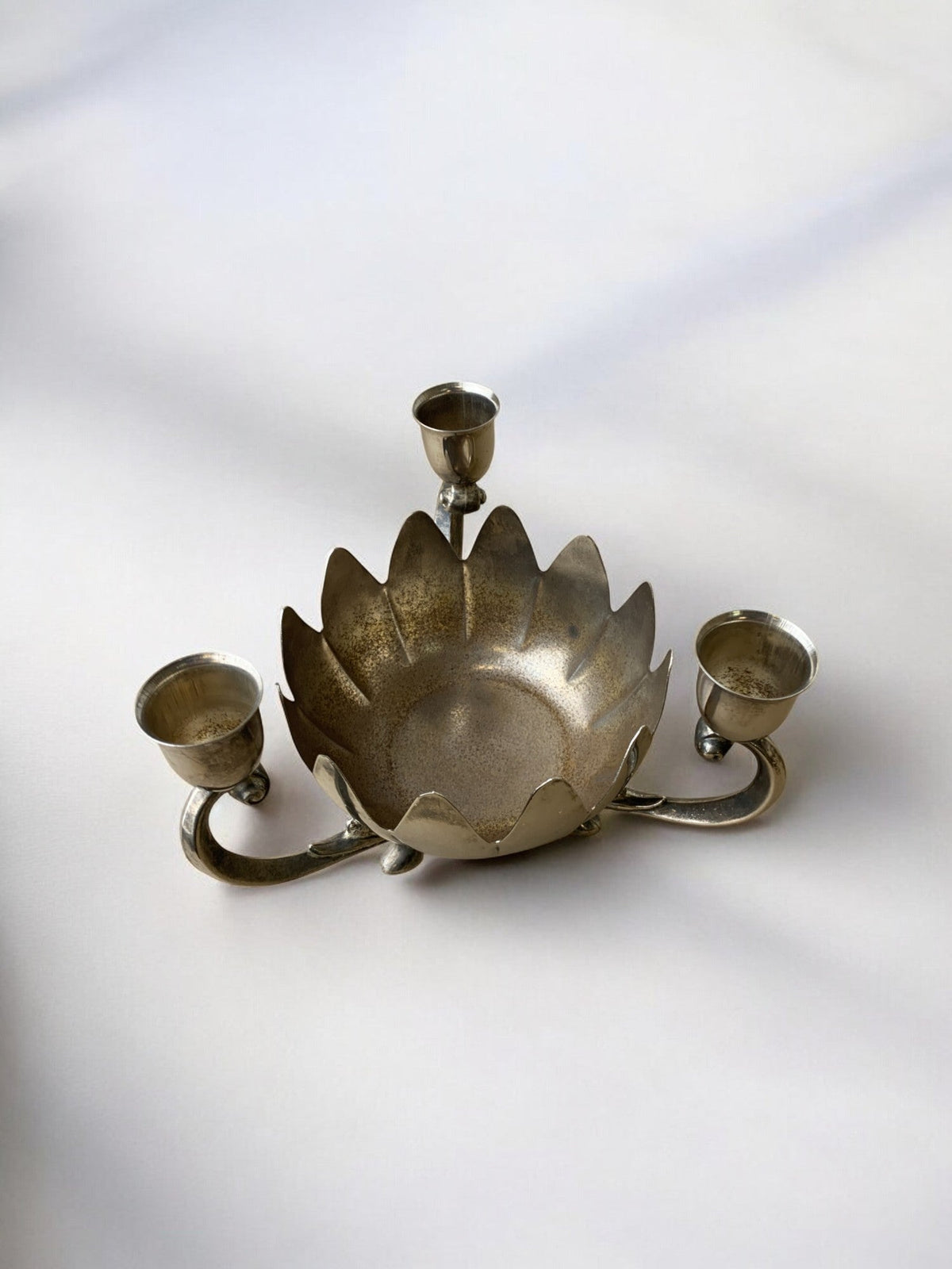 Art deco waterlily Candelholders, France, 1960's — top view on light background