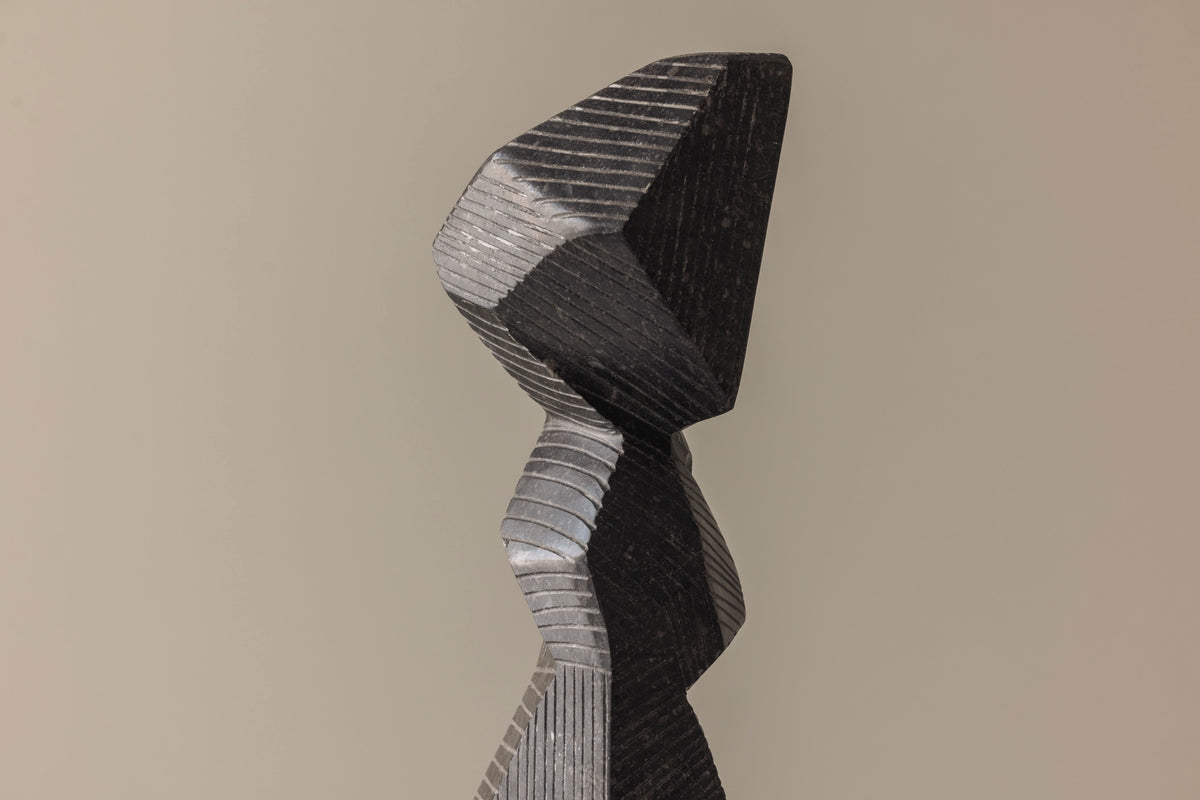 Abstract sculpture Carved from natural stone by Marc Verdoodt, Belgium 1980s. — side angle