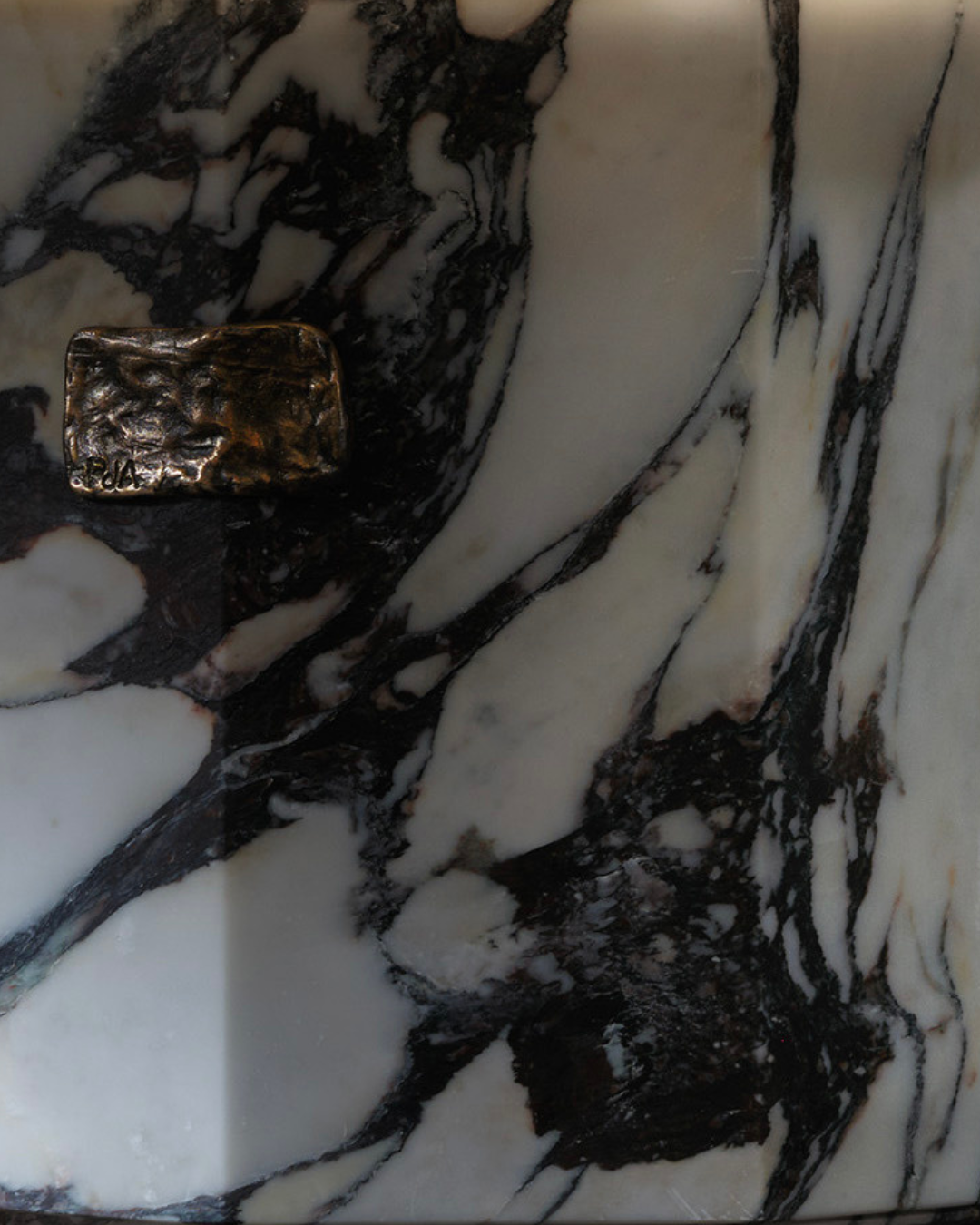 Close-up detail of Calacatta Viola marble veining on Ottavia lamp