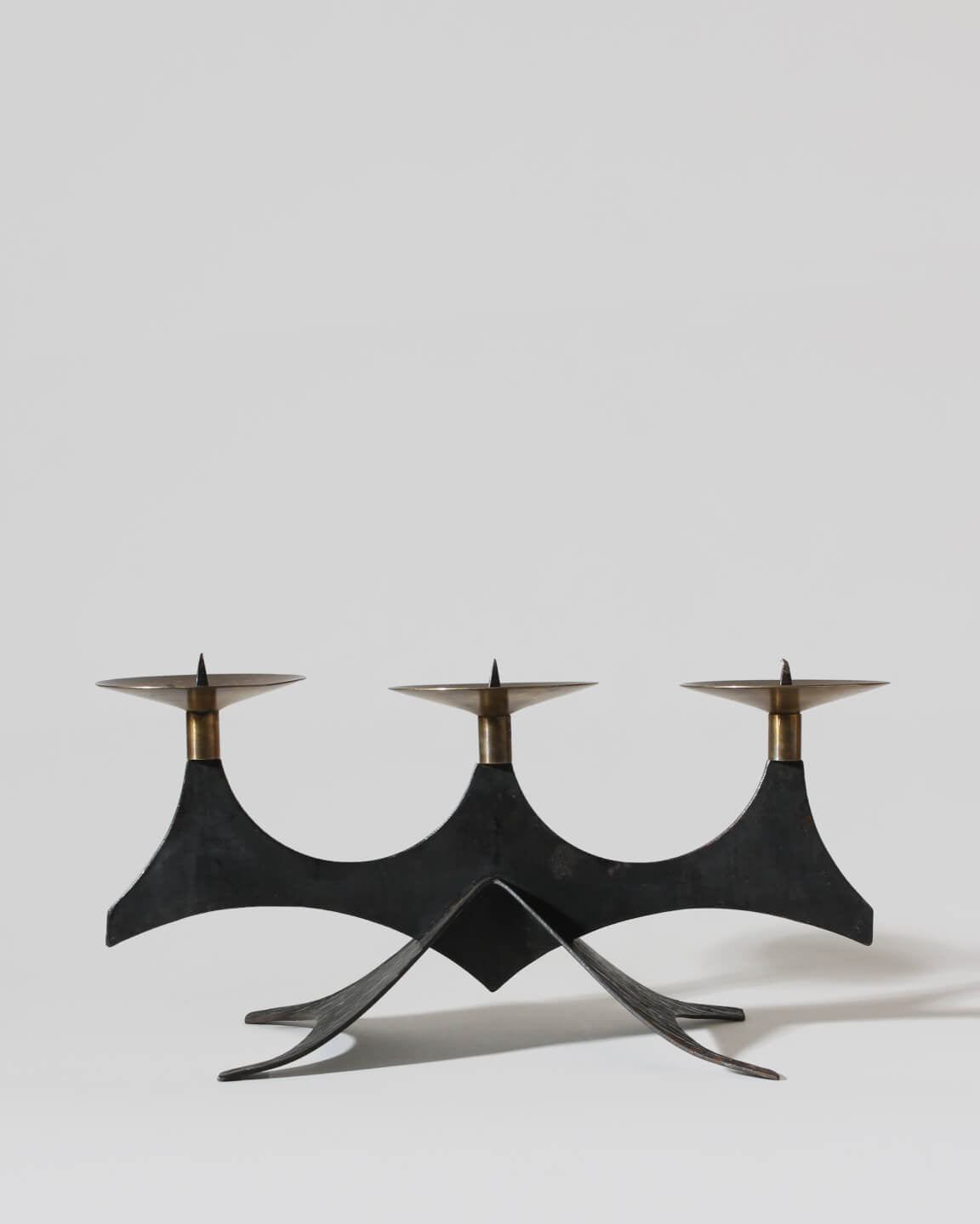 Mid-Century Brutalist Cast Iron And Brass Candelabra by Vintage Stories | The Oblist