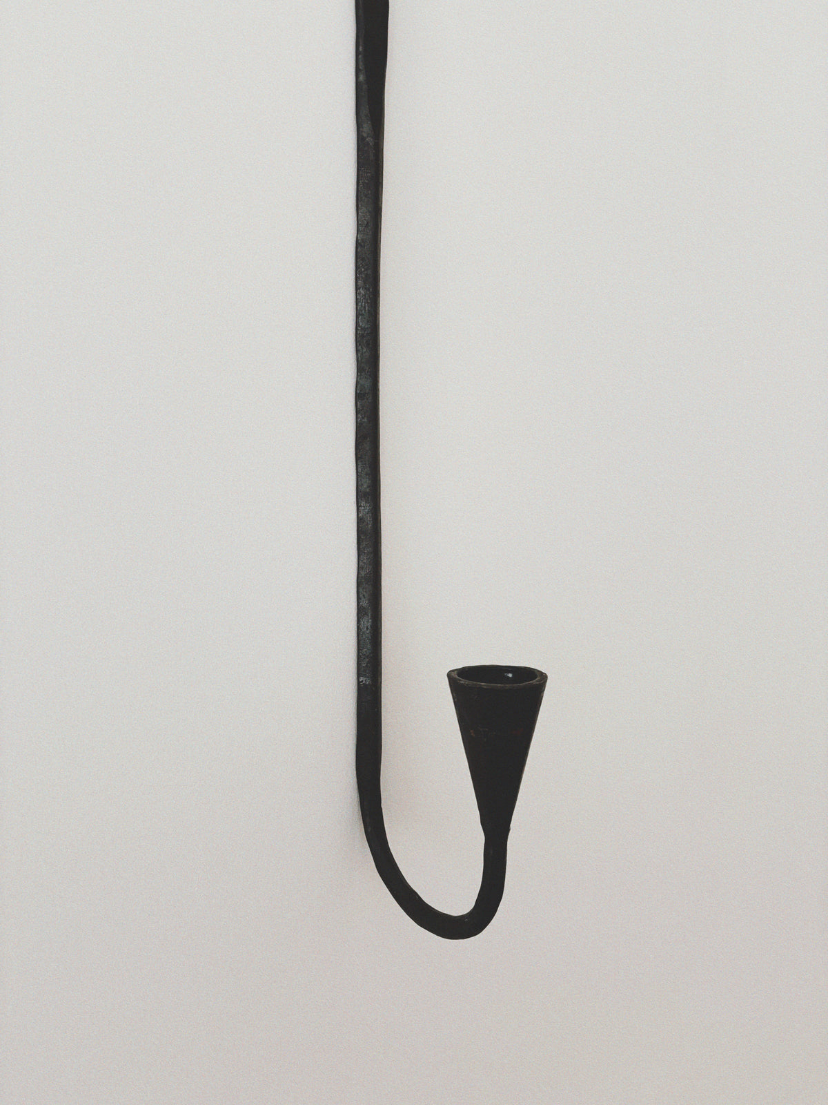 Set of 3 Large Danish Wrought Iron Wall Candlesticks, c. Late 1990s — side view against a white wall