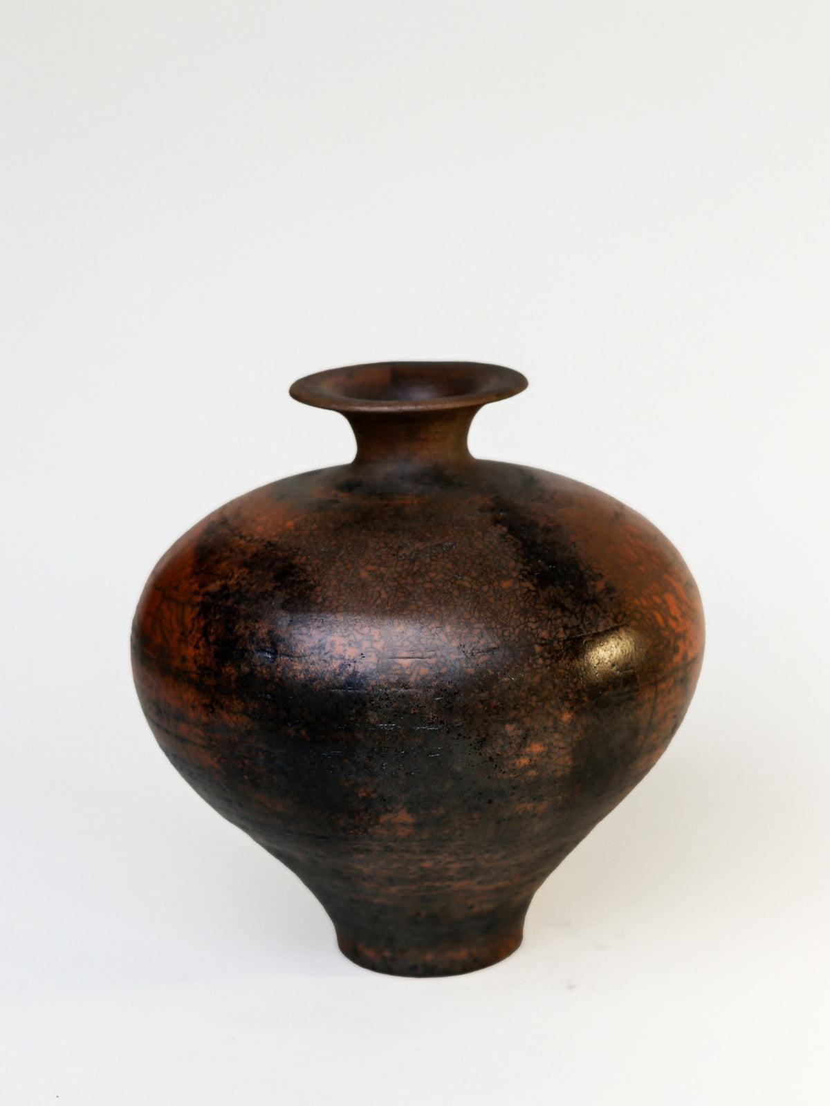 Ven Vase – Terra sigillata, smoke-fired raku — lifestyle setting