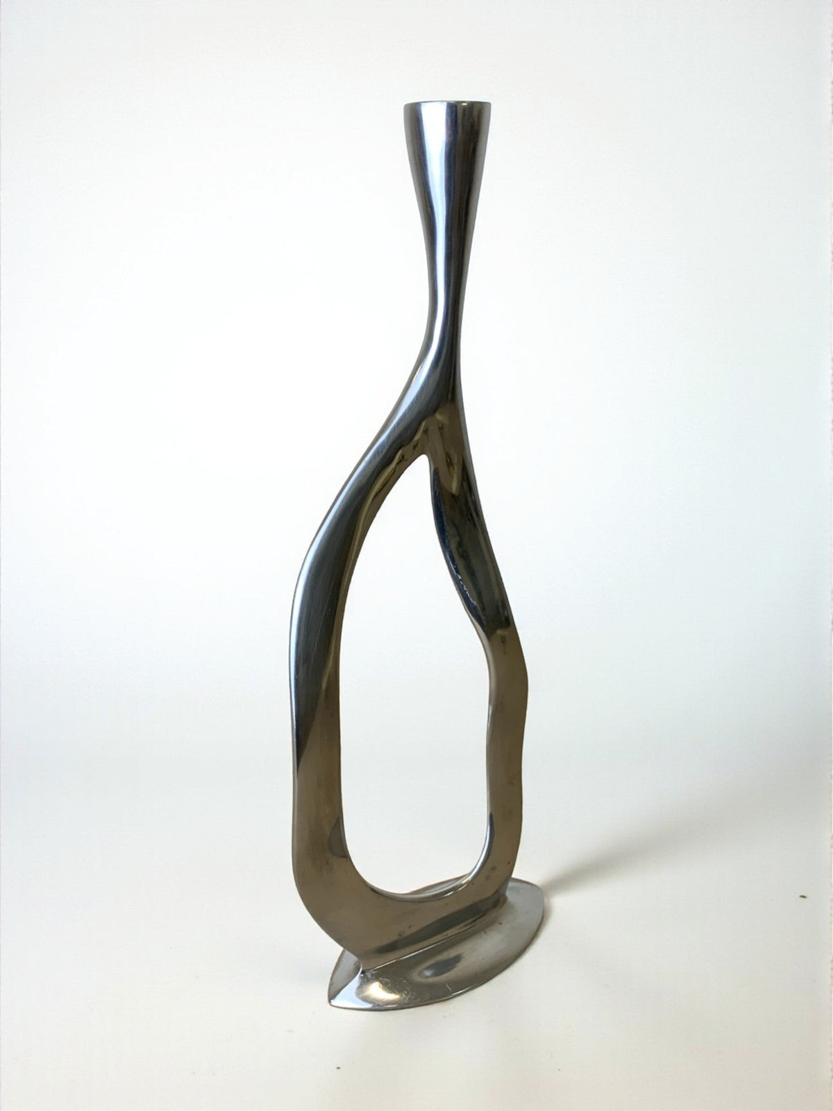 Biomorphic candleholder, solid aluminum, 1970's — side angle