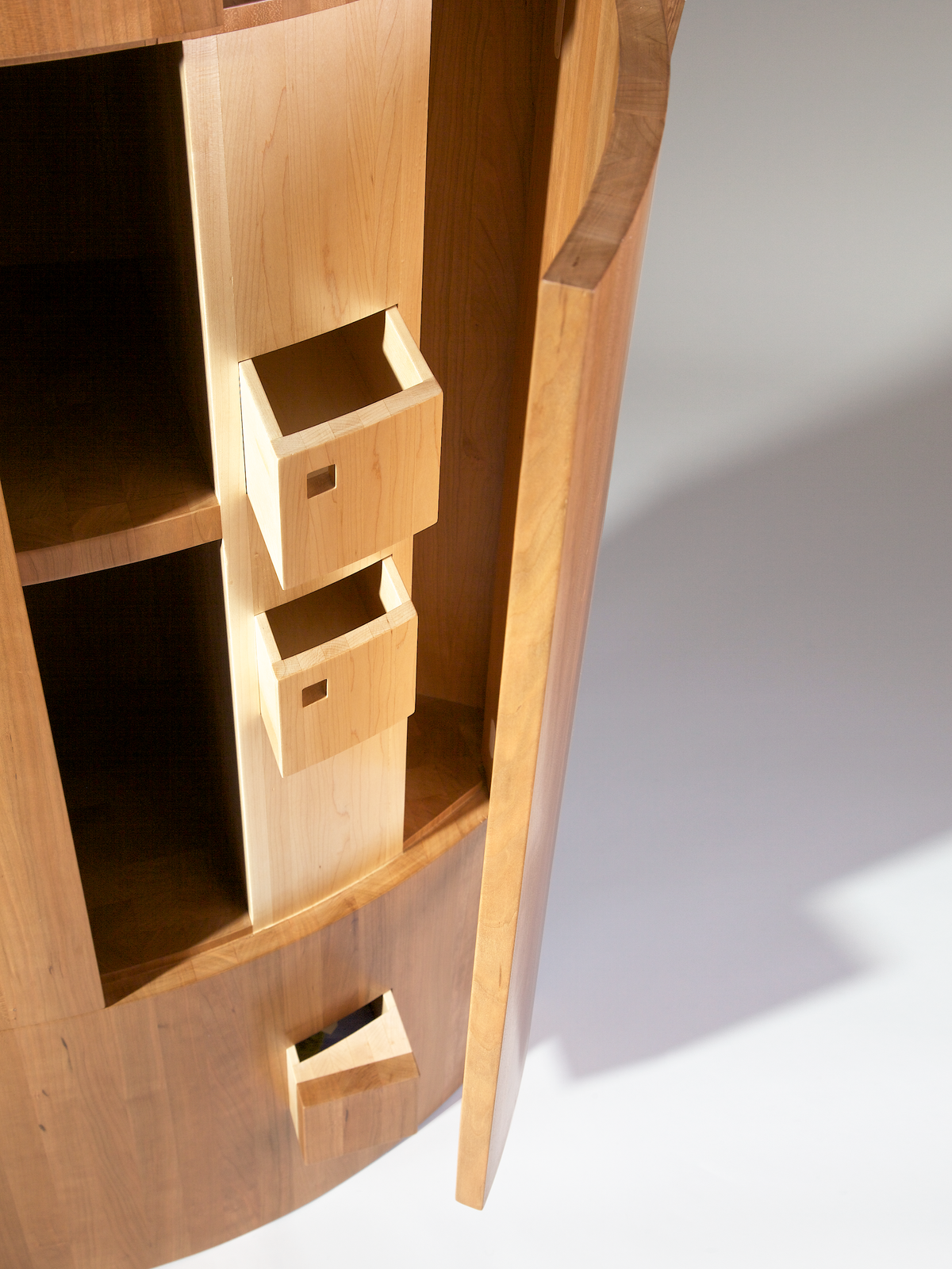 ARound Memory Cabinet — top view of wooden drawers and shelves