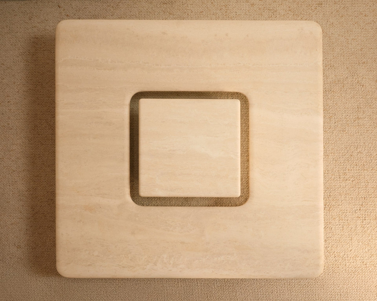 Saturn Travertine Coffee Table — in context