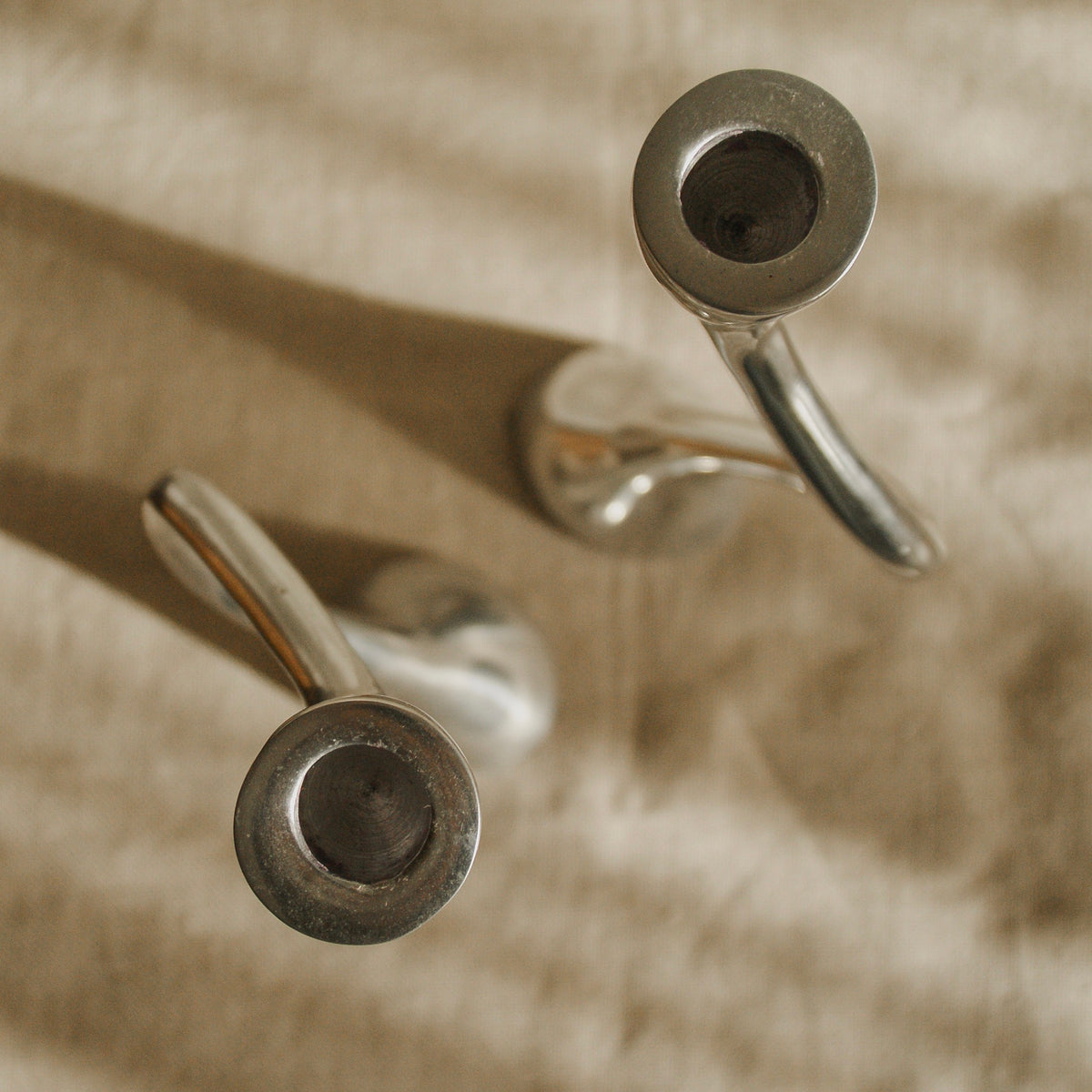 Pair of Curvy Candle Holders — side angle