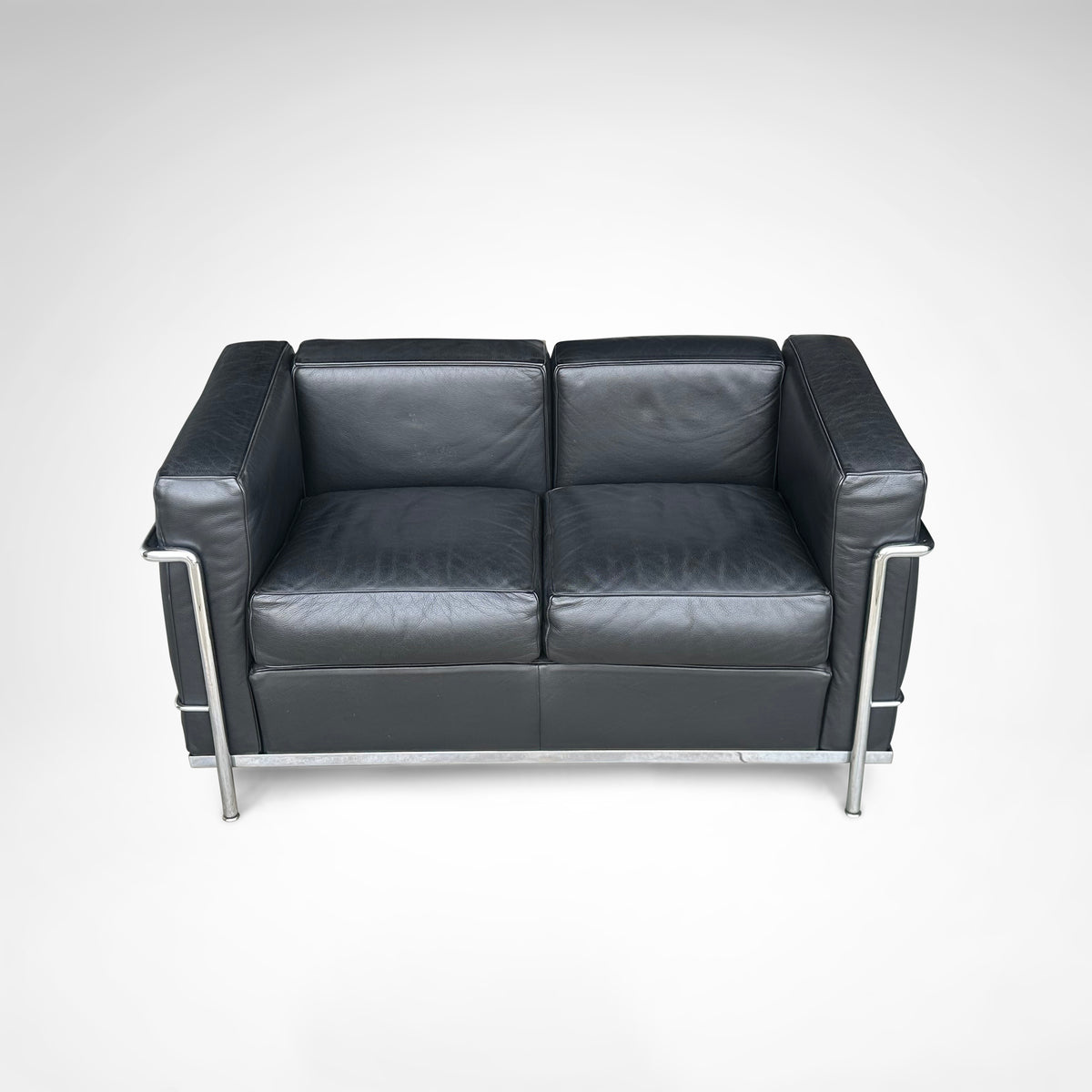 LC2 2-seater sofa by Le Corbusier et al. for Cassina 1990s — top view of black leather upholstery