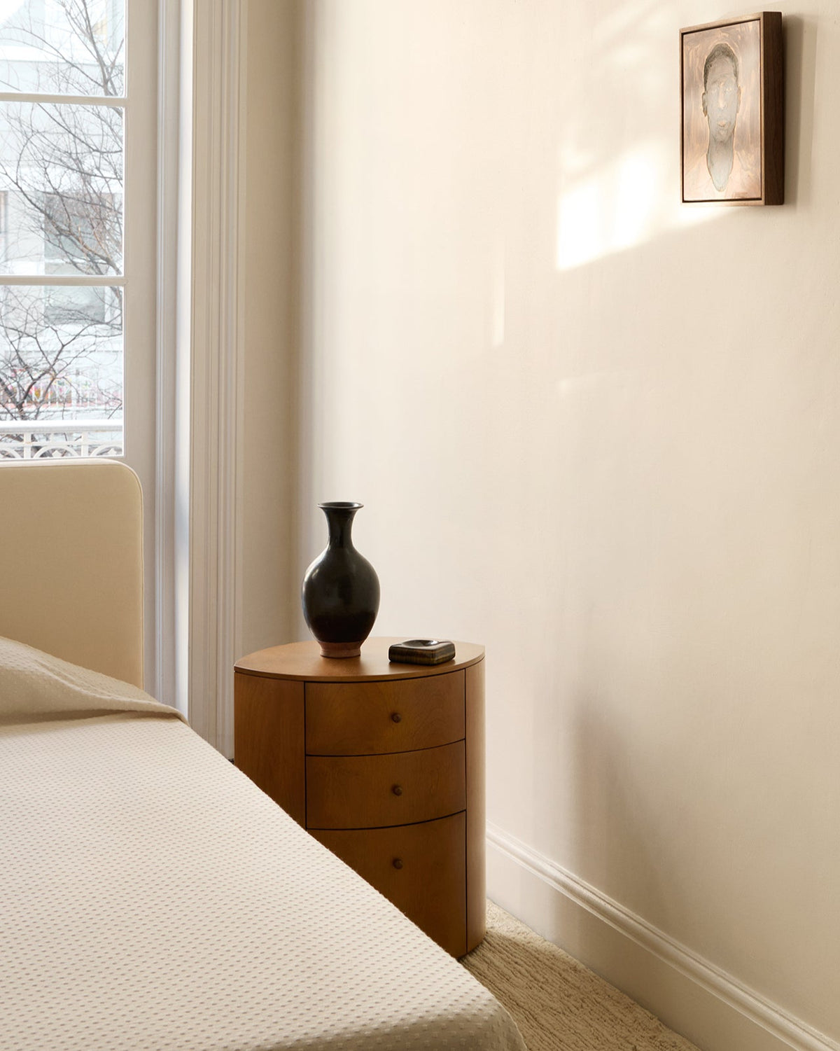 Observer nightstand warm brown birch in minimalist bedroom setting