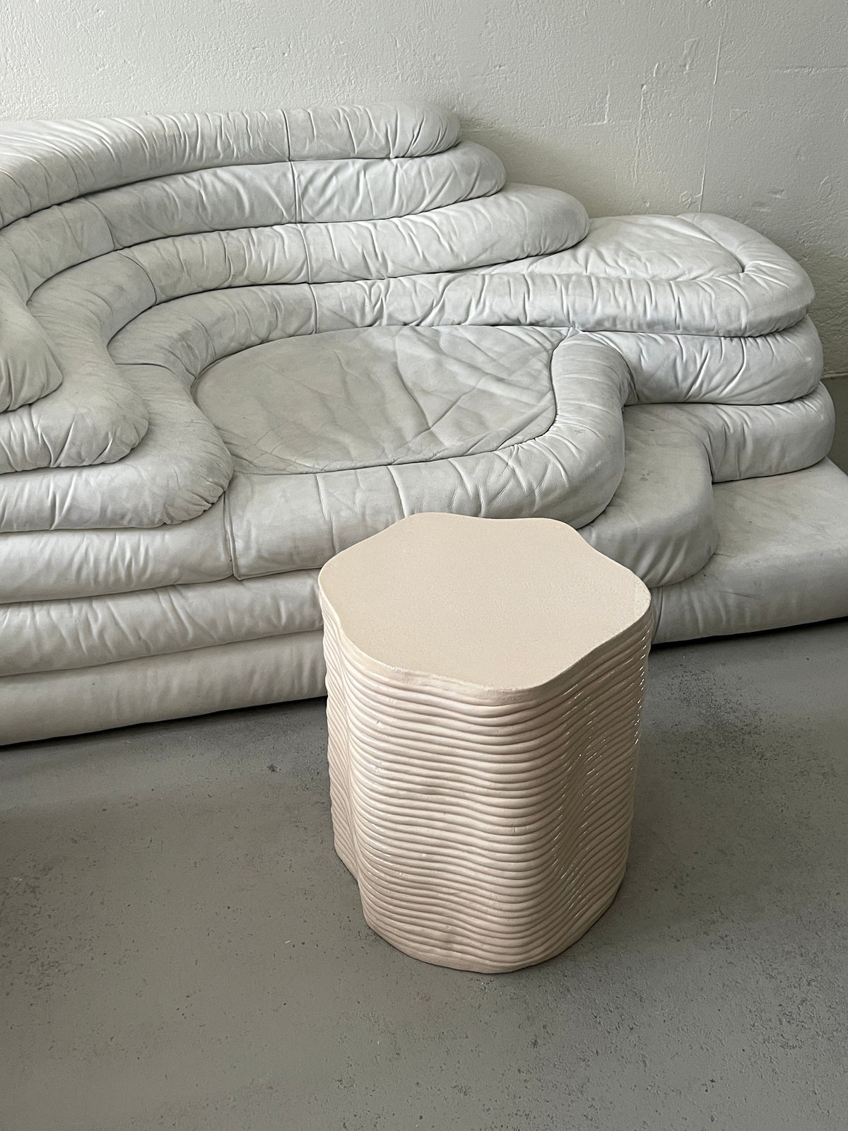 Handsculpted Ceramic Stool Cream — lifestyle setting