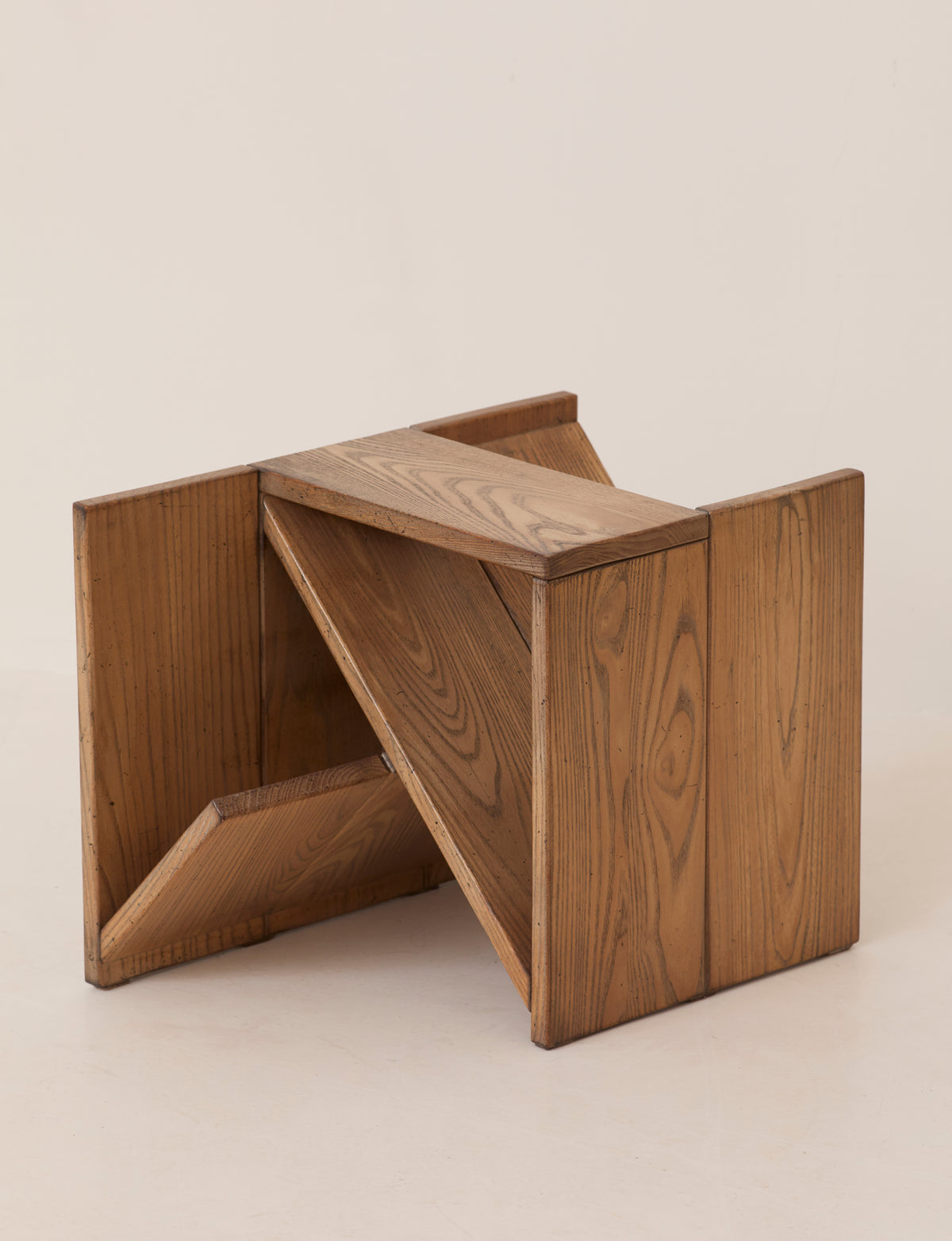 Vintage Side Table / Magazine Rack in Elm Wood by Alain Ladroit for Maison Regain C. 1980 — side angle showing angular design