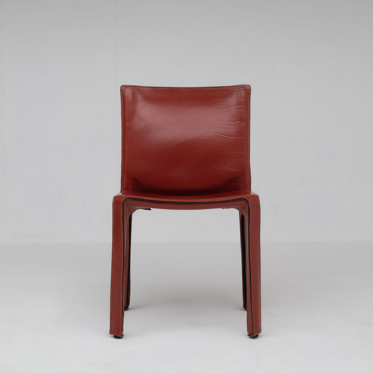 Mario Bellini Cab Chairs for Cassina in Red Leather — lifestyle setting